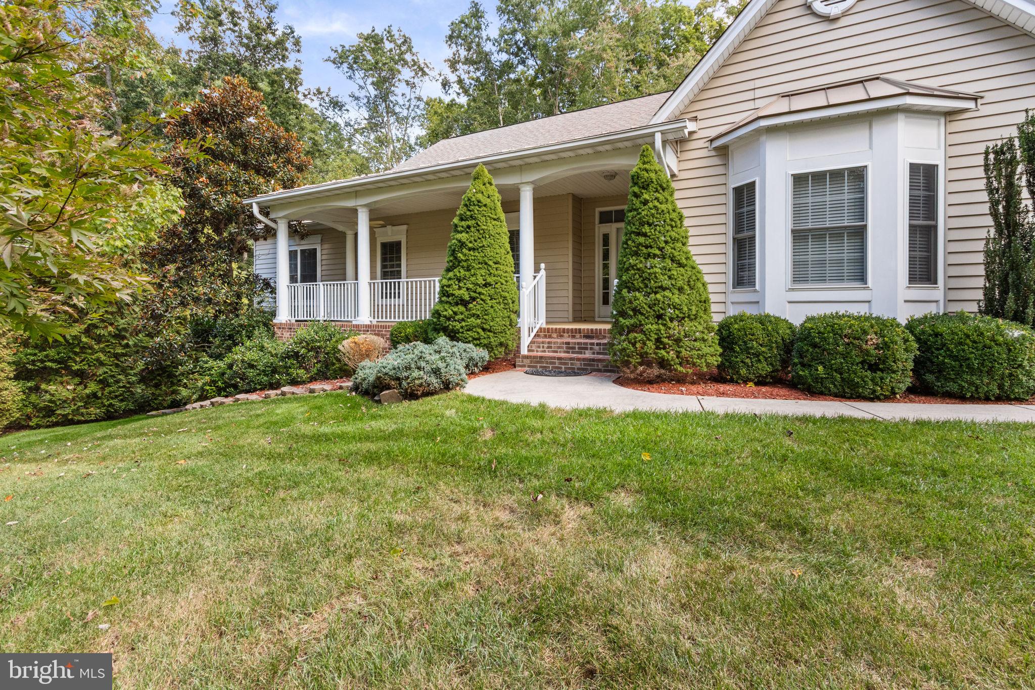 Stunning Two-Level Home in Prestigious Fawn Lake Community. 4 Bedrooms | 3.5 Bathrooms | 2.84 Acres | Private Cul-de-Sac Lot.

Nestled on a quiet cul-de-sac within the highly sought-after gated community of Fawn Lake, this meticulously maintained two-level residence offers the perfect blend of elegance, comfort, and privacy. Featuring 4 spacious bedrooms and 3.5 bathrooms, the home showcases a bright, open-concept floor plan ideal for both everyday living and entertaining.

Step inside to discover soaring ceilings, a dramatic fireplace with custom built-in shelving, and an updated chef’s kitchen that seamlessly flows into the main living areas. Thoughtfully designed indoor and outdoor spaces include a newly installed deck and a screened porch overlooking the serene wooded setting—perfect for year-round enjoyment.

Situated on 2.84 private acres, this move-in-ready property also provides access to Fawn Lake’s exceptional resort-style amenities, including:

• Private lake with boating and fishing
• Arnold Palmer-designed championship golf course
• Elegant clubhouse with dining options
• Resort-style swimming pool
• Tennis courts, sports fields, and scenic walking trails

Offering an unparalleled lifestyle in one of Virginia’s premier communities, this exceptional home is a rare opportunity not to be missed. Schedule your private showing today.