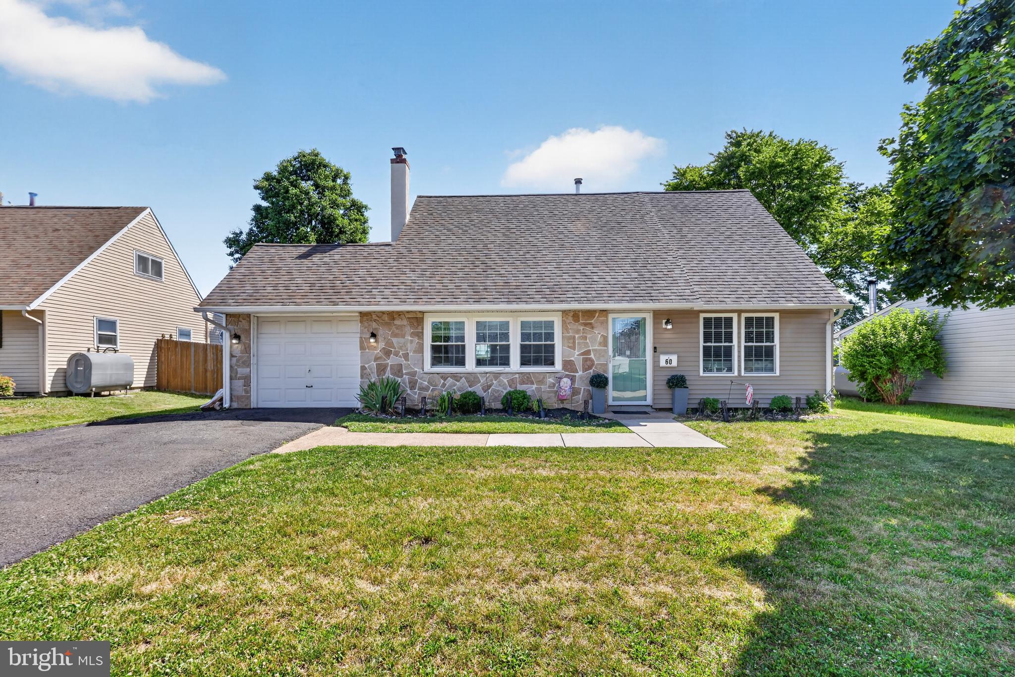 Welcome to this beautifully expanded Cape Cod in the Plumbridge section of Levittown! Plumbridge offers a convenient location with easy access to shopping, parks, major roadways, and everything Bucks County has to offer.

This spacious home features 3 bedrooms and 3 full bathrooms, offering plenty of room for everyday living and entertaining. As you enter, you'll immediately notice the flexibility this home provides, highlighted by the large rear addition that greatly expands the living space.

The heart of the home is the oversized kitchen and dining area, perfect for hosting family gatherings or holiday celebrations. Just beyond, you'll find a versatile bonus room complete with its own full bath—ideal as a family room, guest suite, home office, or playroom.

The first floor also features a generously sized primary bedroom, offering convenient one-floor living. Upstairs are two additional bedrooms and another full bathroom, creating the perfect layout for family or guests.

If you've been searching for a home that combines classic Cape Cod charm with expanded living space in a sought-after Levittown neighborhood, this Plumbridge gem is one you won't want to miss.