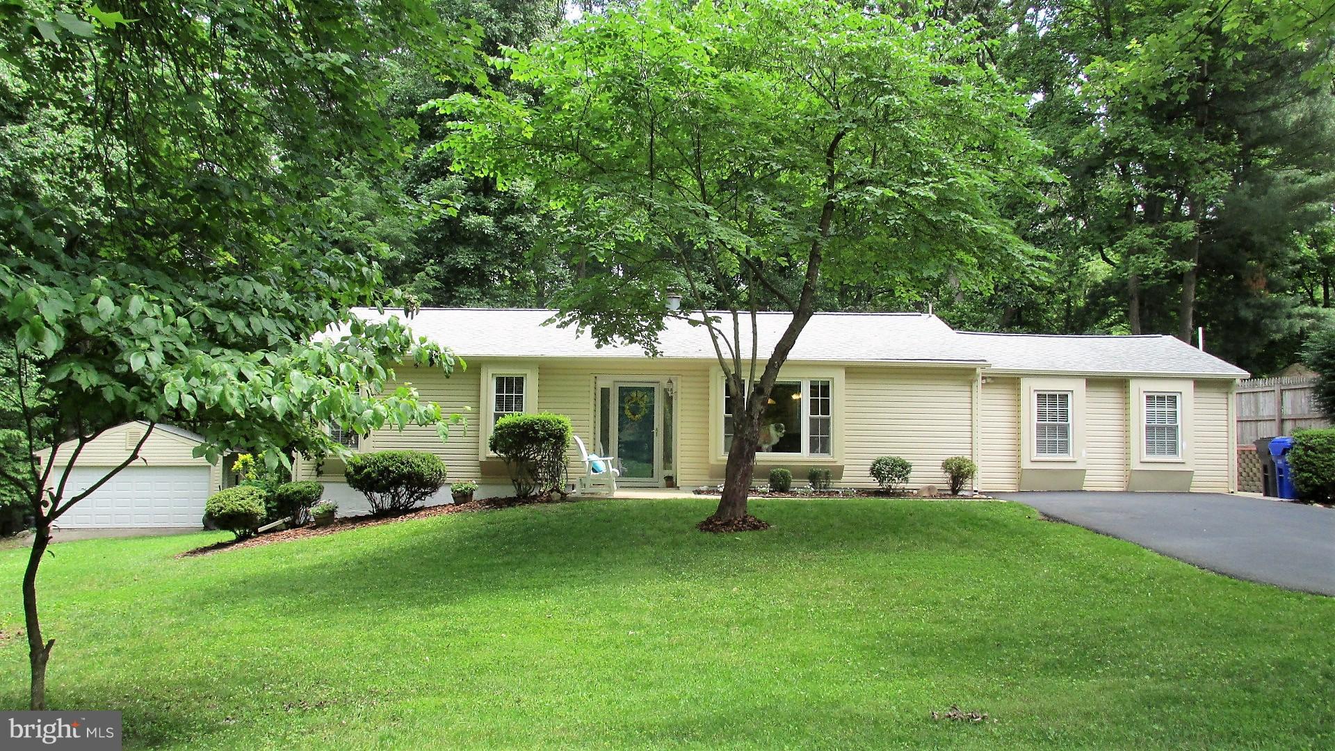 Laurel Branch location. Enjoy 1-lvl living in wooded privacy on quiet cul-de-sac; separate MBR addtn off LR + 2 generous BRs; 2.5 BAs; vaulted Sunrm opens to stamped concrete patio w/flagstone retaining wall & privacy fencing for kids and pets; detached 2-car garage/wkshop at back corner of lot. Great school district &neighborhood; close to shopping and commuter access. Gotta see it!