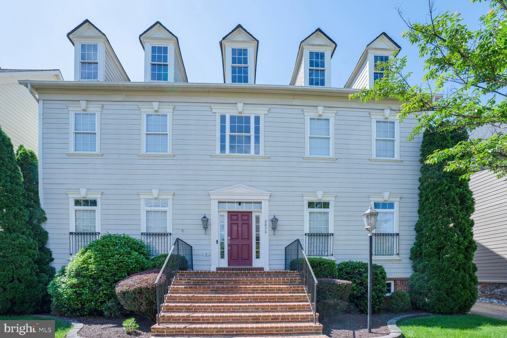 This is your unique opportunity to own a home in the highly coveted, private community of Hearthstone Village, where properties rarely become available.  This elegant STRAUSS model, the largest of the 3 models in Hearthstone Village, offers 4 beds, 4 1/2  baths across 3 levels.  Open and airy with  10' ceilings on the first floor and 9'  ceilings on upper and lower levels.  Quality built with Hardi Plank siding and brick.   
As you enter the main level, you are greeted by gleaming hardwood  floors that flow through the grand 2-story foyer, living room, formal dining room,  gourmet kitchen and office/library--ideal for work from home convenience. The gourmet kitchen is equipped with sleek stainless-steel appliances that cater to all your culinary needs.   The convenient staircase provides easy access to the Family room which features a cozy gas fireplace and coffered ceiling.    From the Family room, step out onto the deck and private brick patio--perfect for grilling and entertaining outdoors.  A unique highlight of this property is the backyard privacy; this home site sits on one of only a few lots in the neighborhood that offers such seclusion.
Upstairs, double doors lead to an oversized Master Suite with coffee bar, sitting area, dual walk-in closets and bathroom foyer with make-up counter.   The primary bathroom is generously sized and includes a large soaking tub, double vanities, and two private water closets.   A notable feature of the primary bathroom is the dual entry walk-in shower, which incorporates windows to allow natural light.   In addition to the Master Suite, the upper level accommodates three other large bedrooms, one with en suite bath and the other two flanking a Jack & Jill bath.   For practicality, the laundry room is situated on the bedroom level and is outfitted with counter space, both upper and lower cabinets and a built-in sink.                                        The charming lower-level English basement features an expansive recreation room, full bath, and two flexible use areas, perfect for adapting to your specific needs.   The 2-car garage is equipped with an EV charger.  This intimate neighborhood of just 58 homes provides a sense of exclusivity while still offering easy access to major commuter routes, including I66, Rt50, Dulles Toll Road (Rt 267), Vienna Metro, Dulles International Airport, Washington D.C. and Reagan National Airport.  Abundant shopping and dining options are just minutes away.   Fantastic opportunity to purchase a home in this rarely available location.