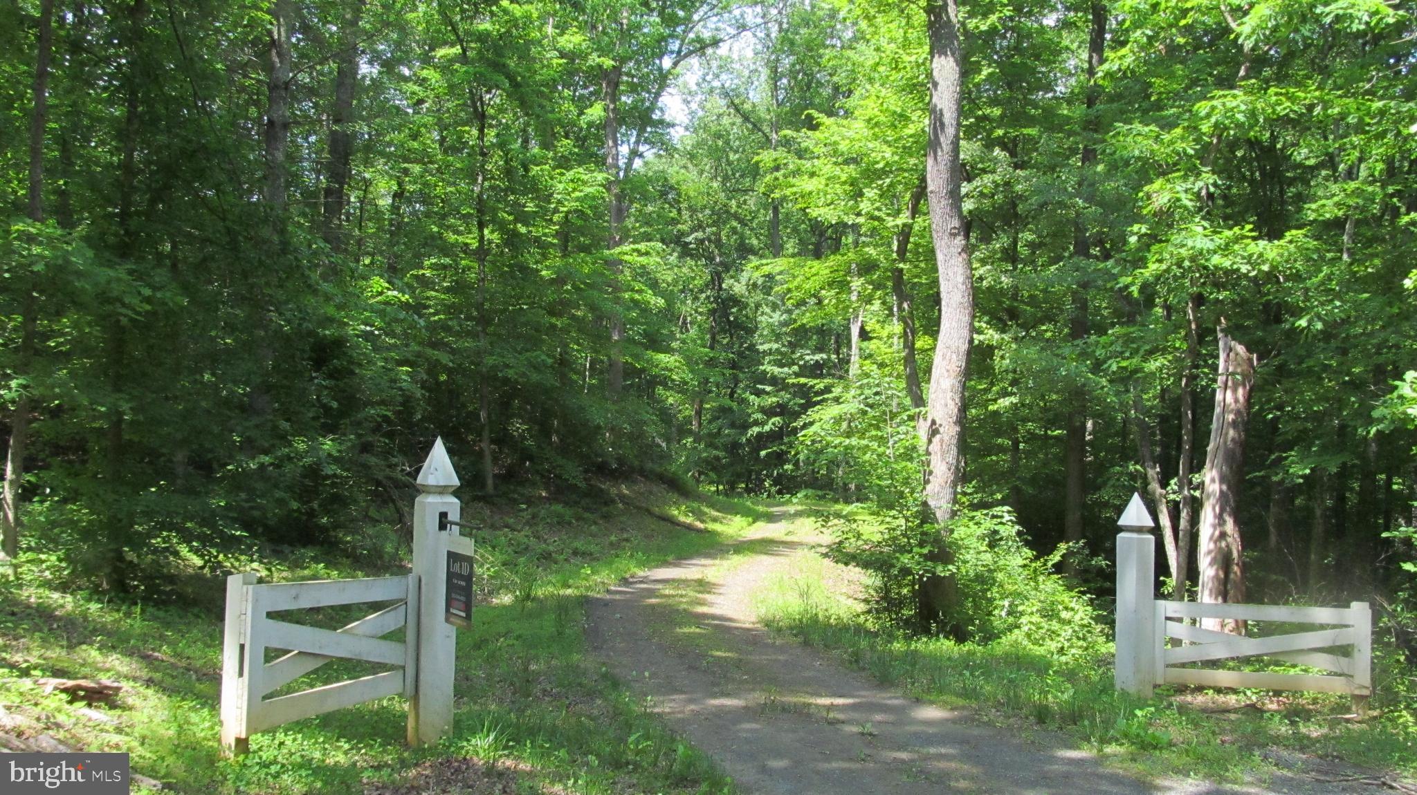 Beautiful 5.81 acres waiting for you to build your dream home in Greene Landing, Barboursville, VA.  A hardwood forest front and a side view of a pond surround this great home site.  The driveway to the cleared building site has already been constructed. The sellers paid for a full site, soil, and well certification, summary, and permit application.  Located less than 30 minutes from Charlottesville and Culpeper,  the convenient location makes it even more appealing.  Drive out and take a look. It is priced below the tax-assessed value. Please look in the documents section for the soil and water information.