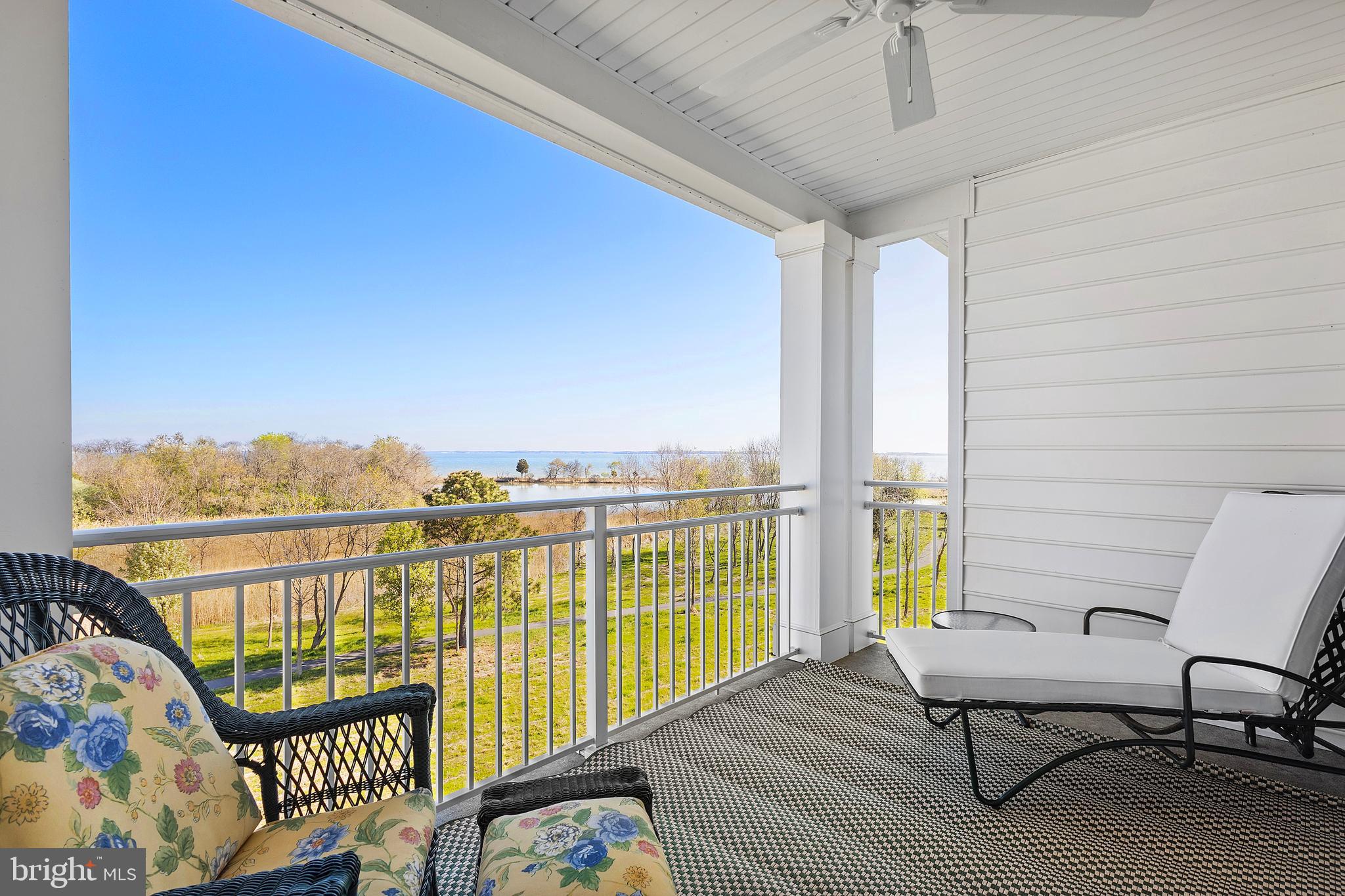 Rare penthouse unit with year-round water views perfectly positioned to capture stunning sunrises every morning. This home has been owned and meticulously maintained by the original owner who spared no expense and opted for every builder upgrade that was offered, over $60,000.00 in options. The open concept design seamlessly connects the living room, dining area, and kitchen areas, all enhanced by expansive windows letting in an abundant amount of natural light.  Experience resort style living in the highly sought after Four Seasons at Kent Island, a premier 55+ waterfront community.  Residents enjoy access to world class amenities, including indoor and outdoor pools, walking trails, a Chester River pier. Ideally located just minutes from waterfront dining, shopping, and the Chesapeake Bay Bridge, this home offers the perfect blend of relaxation, convenience and low maintenance living at its finest. Additional interior photos coming soon!