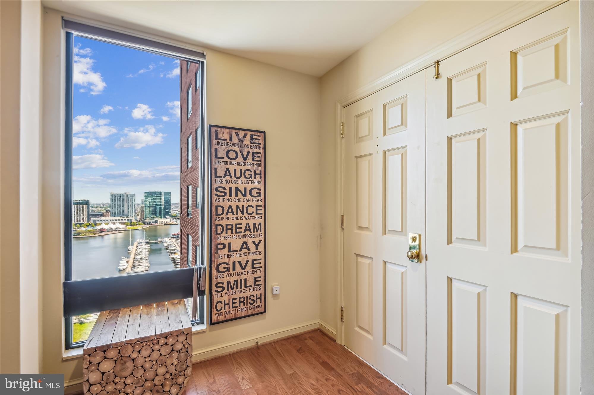 2 bedroom/2 bath condo with spectacular views of both sunrises over the Inner Harbor and panoramic sunsets over the park-like Otterbein neighborhood, Camden Yards, and M&T Stadium. Large living and dining areas and a pass-through bar in the kitchen equipped with recently replaced stainless steel appliances give the perfect flow for entertaining. A nice, wide hallway offers storage and plenty of room to display artwork and leads to the sleeping quarters, including a large primary suite with a bathroom and a generous custom walk-in closet. The 2nd bedroom/office, with spacious closets, allows for versatility. Sellers have also replaced the water heater, heat pump, and all the faucets during their ownership, The Royal Sonesta Harbor Court Hotel, connected to the Harbor Court condo building, gives direct indoor access and discounts for residents on food, gym (w/indoor pool), racquetball & tennis courts, and hotel rooms. The condo provides a doorman, 24-hour front-desk service, 1 storage locker, and 1 parking space in the attached, gated garage. Superb location across the street from the waterfront promenade and Baltimore's famous Inner Harbor attractions. Close to restaurants, business district, shopping, stadiums, hospitals, and the MARC train with service to DC.