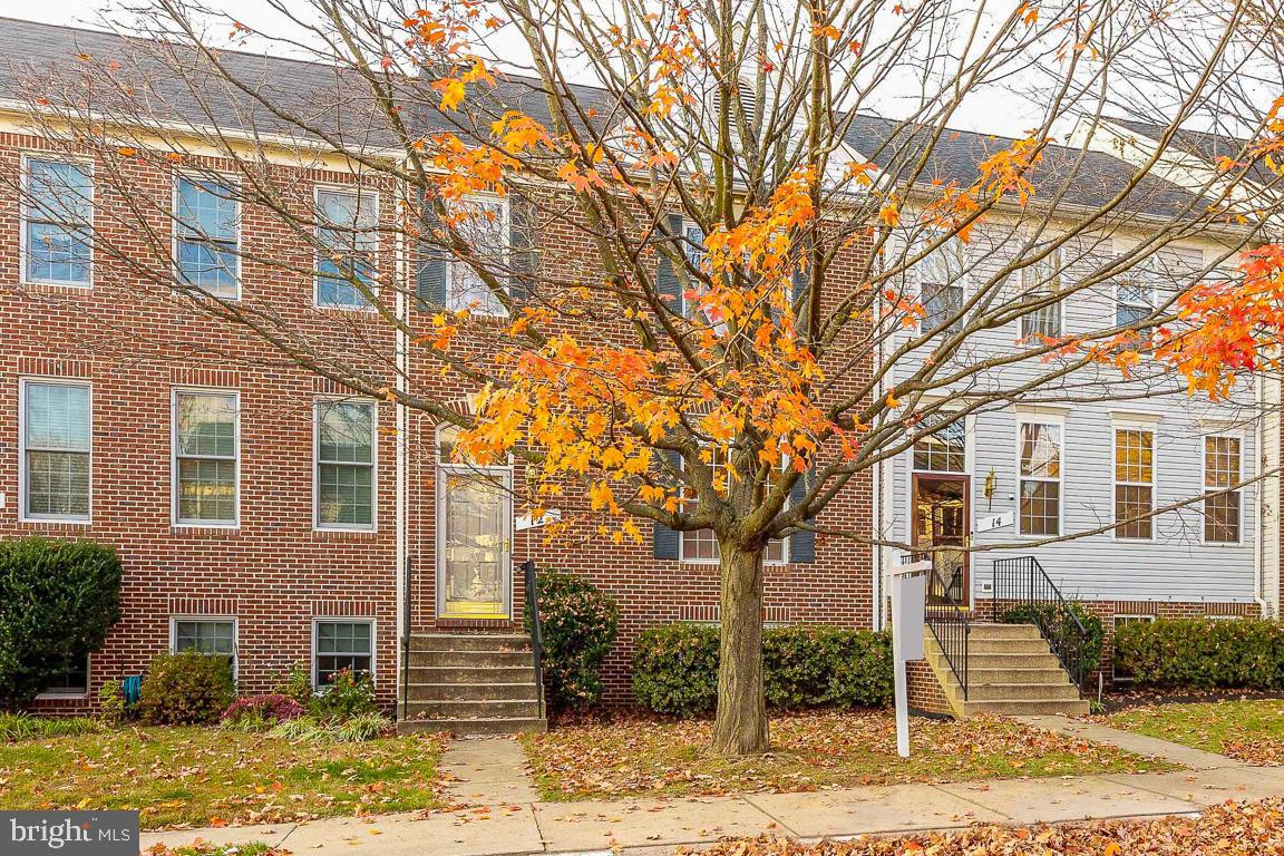 Welcome to this bright, spacious and upgraded 4 bedroom, 3.5 bath home with over 2,300 sq. ft. of living space!  Recent upgrades include fresh paint throughout, new flooring on all levels, brand new and upgraded GE appliances including a gas stove with center griddle, new kitchen counters, new faucets and toilets throughout and stylish lighting.  Special features include a beautiful brick front, custom plantation shutters in the living room and kitchen, spacious kitchen with large breakfast area/family room, center island with bar seating, pantry, large deck off of kitchen, master bedroom with two closets and vaulted ceilings, master bath with new shower and separate soaking tub, spacious walk out lower level with large family room, bedroom/office and full bath.  This exceptional home is located in a quiet court with ample parking.  The community offers a lake with walking trails, playgrounds and a community pool.  There are many restaurants, shops and grocery stores nearby.  This home is move-in ready!  You are going to love living here!!