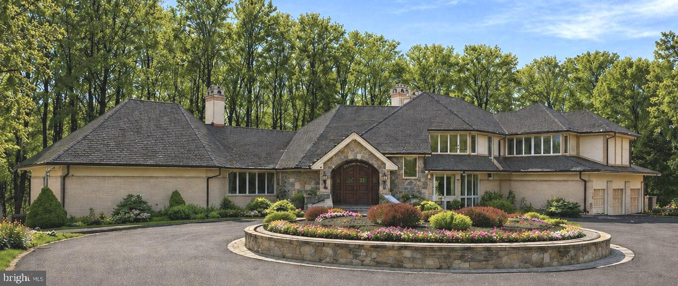 Welcome to a spectacular two-acre estate overlooking the Potomac River. This architectural gem boasts 11,575 total square feet and seven en-suite bedrooms (one main level primary, four upper, and two lower) on three incredibly bright sunlit levels. You will feel this home’s warmth the moment you enter, with fantastic views of the outdoors directly from its entrance vestibule. Step into its main level of elegance and comfort. Soaring ceilings in the great room create a sanctuary of light throughout the home. Take advantage of a caterer’s kitchen for large engagements, cabana bath for family and guests, and even an elevator shaft if ever needed for future accessibility. The sun-filled lower level is an entertainment retreat, featuring an expansive dual-sided social area with bar, game rooms, and custom wine room for your private collection. Step out to a magnificent exterior ideal for both quiet relaxation and grand soirees. Enjoy a dip in the heated pool or unwind in the hot tub. Dine alfresco under the pavilion or gather in the stunning glass gazebo surrounded by nature. This great estate, with easy access to our Nation’s Capital, is perfect for any owner wanting ultimate privacy, convenience, and luxury in the heart of Potomac. 

•Experience this exclusive estate by private appointment only. 
•All Statues both inside & outside will be removed upon the sale of the home