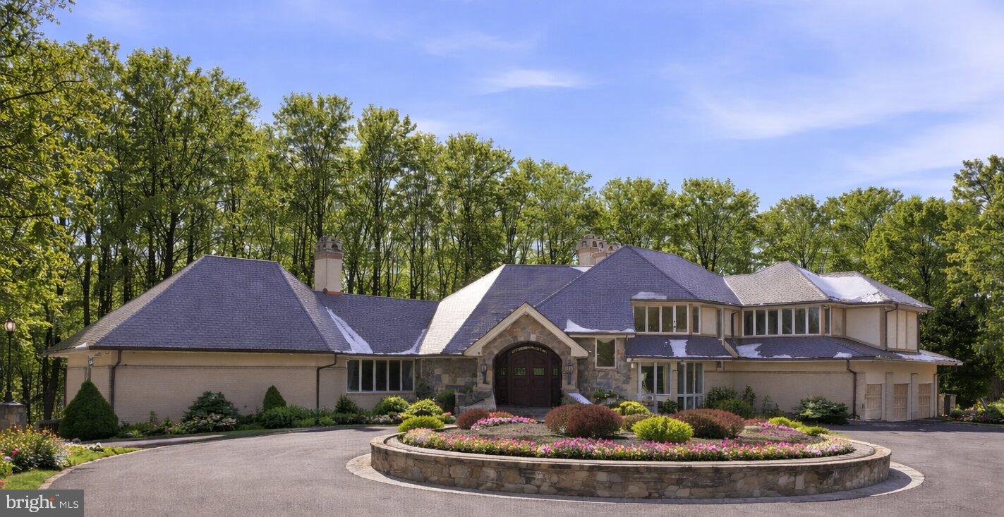 Welcome to a spectacular two-acre estate overlooking the Potomac River. This architectural gem boasts 11,575 total square feet and seven en-suite bedrooms (one main level primary, four upper, and two lower) on three incredibly bright sunlit levels. You will feel this home’s warmth the moment you enter, with fantastic views of the outdoors directly from its entrance vestibule. Step into its main level of elegance and comfort. Soaring ceilings in the great room create a sanctuary of light throughout the home. Take advantage of a caterer’s kitchen for large engagements, cabana bath for family and guests, and even an elevator shaft if ever needed for future accessibility. The sun-filled lower level is an entertainment retreat, featuring an expansive dual-sided social area with bar, game rooms, and custom wine room for your private collection. Step out to a magnificent exterior ideal for both quiet relaxation and grand soirees. Enjoy a dip in the heated pool or unwind in the hot tub. Dine alfresco under the pavilion or gather in the stunning glass gazebo surrounded by nature. This great estate, with easy access to our Nation’s Capital, is perfect for any owner wanting ultimate privacy, convenience, and luxury in the heart of Potomac. 
Exterior Photos and Videos to come in the Spring...
•Experience this exclusive estate by private appointment only. 
•All Statues both inside & outside will be removed upon the sale of the home