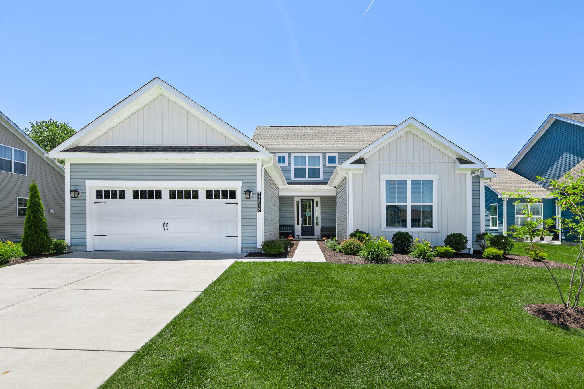 Welcome to coastal luxury living in this impressive Wilmington model by Beazer Homes, built in 2024 and thoughtfully designed for both entertaining and everyday comfort with 2986 sq ft of living space. This move-in ready home features 5 bedrooms, 3 full bathrooms, and an open-concept floor plan that perfectly captures Delaware beach living. Luxury vinyl plank flooring flows through the first-floor main living area, with ample seating for large groups to gather around a cozy gas fireplace. The gourmet kitchen is a true centerpiece, featuring upgraded soft-close cabinetry, premium appliances and double wall ovens with true convection cooking and smart connectivity. The first-floor primary suite offers a peaceful retreat with a tray ceiling, upgraded vanity and elegant finishes, while two additional first-floor bedrooms and shared bathroom provide flexibility for guests or home office space. The first floor also offers abundant storage, with expanded space in the laundry room and oversized two-car garage.
Upstairs, there are two generously sized bedrooms and full bath, along with a loft to create the perfect second living area, offering flexibility as a media room, exercise room, or workspace for guests. This home is set on a wonderful oversized premium lot with a pond view in front, and large fenced backyard! Enjoy the screened-in-porch with morning coffee, the convenient outdoor shower when returning from the beach, or take advantage of the exterior gas line for grilling and chilling on the custom patio. Community amenities include a pool, clubhouse, gym and tennis/pickleball courts. With low HOA fees, peaceful community surroundings, and a property filled with premium upgrades, this is coastal living at its best! Conveniently located minutes from all the local area has to offer, including Bethany Beach, Ocean City, championship golf courses, Freeman Arts Pavilion, fantastic restaurants and shopping! Sold mostly Furnished - see Exclusion List in the Documents.
