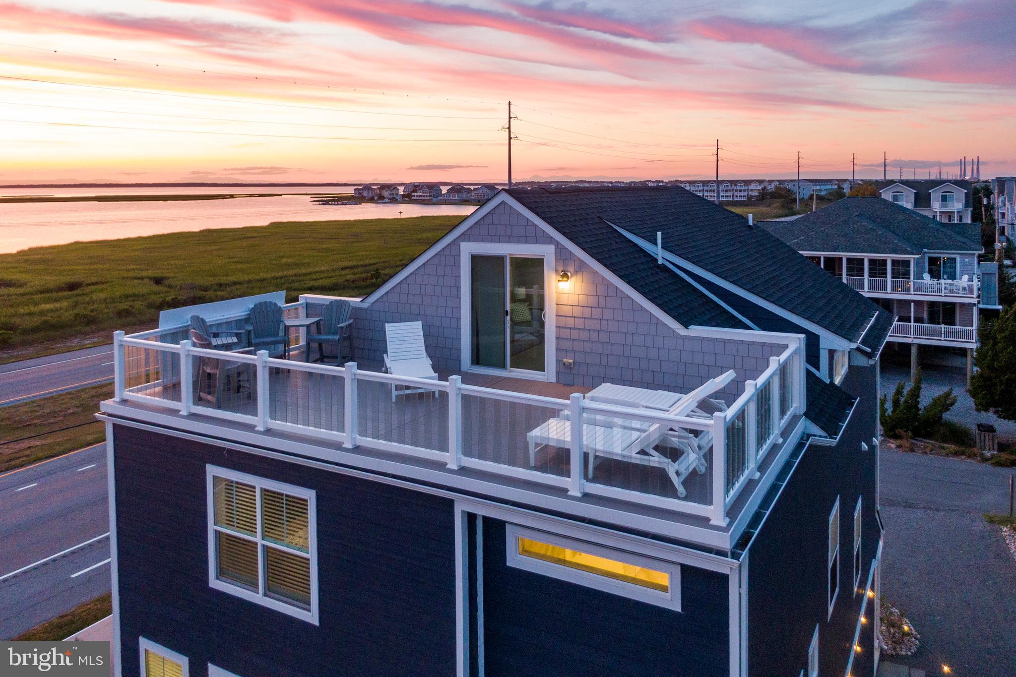 Coastal Living Redefined ​in North Bethany Beach 

Perfectly positioned between the ocean and the bay, this newly constructed custom masterpiece offers the ultimate blend of comfort and luxury—just steps from a pristine private beach. Painstakingly designed for effortless beach-life living, the residence features a state-of-the-art chef’s kitchen, floor-to-ceiling windows, soaring coffered ceilings, and open, light-filled interiors.

An entertainer’s dream, the home’s modern layout opens seamlessly to multiple expansive decks—ideal for lounging, sunset cocktails, and classic crab feasts. 

Every detail has been thoughtfully curated to enhance life at the beach. Located in the sought-after private community of Tower Shores, residents enjoy the serenity of a secluded shoreline while being just minutes from Dewey Beach’s nightlife, Rehoboth’s award-winning dining, and downtown Bethany’s coastal charm.

Don’t miss your opportunity to own this extraordinary retreat situated on Delaware’s glorious Bethany Beach coastline. Contact Mary Rice to arrange a private tour.  It has an impressive rental history and grossed over 100k in 2025