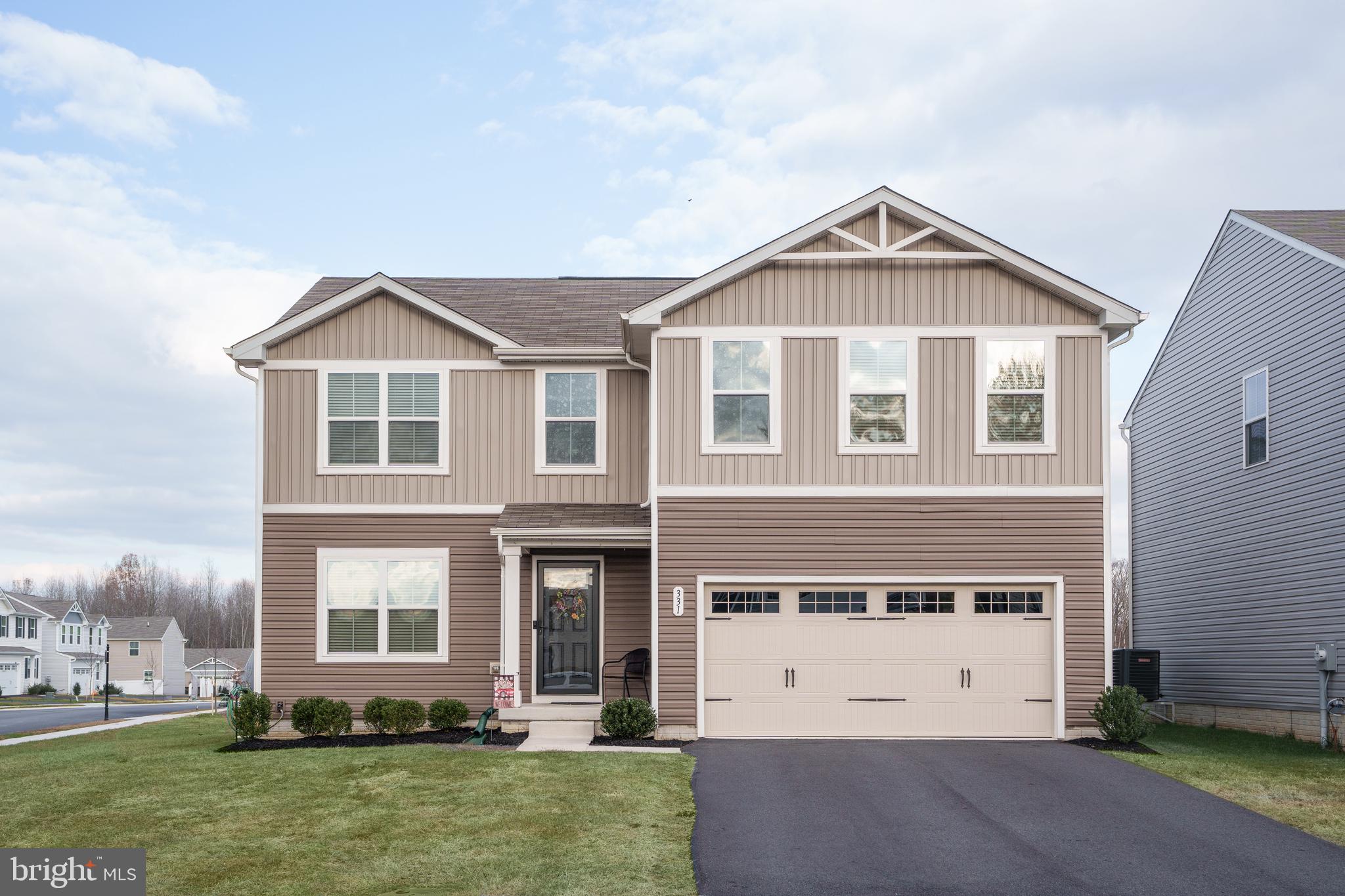 WOOHOO! Why wait for new construction when you can move right in to this new home on a corner lot, built in 2020. Enjoy the new community pool, clubhouse and dog park. Main level features LVP flooring throughout,  an open layout with an eat-in kitchen, large island, white cabinets, granite counters, stainless appliances and pantry. Glass slider in kitchen offers lot of natural light and leads to the new paver patio that will be perfect for entertaining. Upper level features four bedrooms including owners suite with private bath,  two walk-in closets, hall bath with LVP flooring and dual vanity plus bonus loft area that could be used as a 5th bedroom or would make a great home office or playroom.  You will love the convenience of upper level laundry. Large unfinished basement with rough-in. Close to RT 40, the town of North East, marinas and great local restaurants.