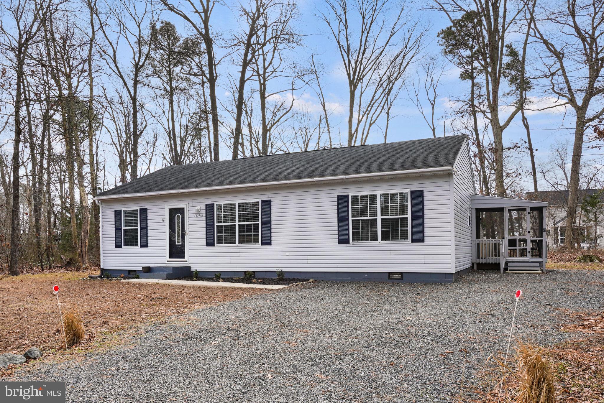 Nestled in the serene Captains Cove community lies this charming 3-bedroom ranch style home, a perfect blend of comfort & convenience. As you step inside, the spacious living room welcomes you with luxurious LVP flooring that extends throughout, providing a seamless flow & easy maintenance. A large eat-in kitchen boasts warm oak cabinetry, offering ample storage space alongside modern appliances. You'll love the primary suite, which features a private bathroom, ensuring a peaceful retreat. The interior's comfort spills out onto a screened-in porch where one can enjoy the outdoors without the bother of pests. Entertaining and relaxation continue in the expansive fenced-in backyard, which hosts a rear deck ready for barbecues and outdoor gatherings. A shed provides additional storage or space for your hobbies. This home offers a wonderful blend of indoor comfort & outdoor enjoyment, complete with all the amenities of the Captains Cove community.