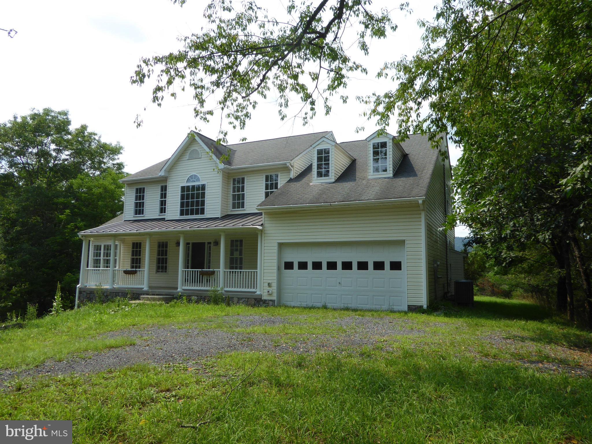 CALL NOW TO SEE THIS COLONIAL HOME WITH LOTS OF PRIVACY AND SECLUSION. THIS FOUR BEDROOM HOME HAS A DEN, GREAT ROOM , SPACIOUS  EAT IN KITCHEN WITH DISHWASHER, STOVE AND REFRIGERATOR, SUN ROOM, GRAND STAIRCASE , 2.5 BATHROOMS, LAUNDRY ROOM, GARAGE AND BASEMENT. ALL THIS IS LOCATED ON 26 ROLLING , CLEARED AND WOODED ACRES WITH A POND AND GAZEBO. BECOME A MOUNTAINEER AND MOVE TO WEST VIRGINIA.