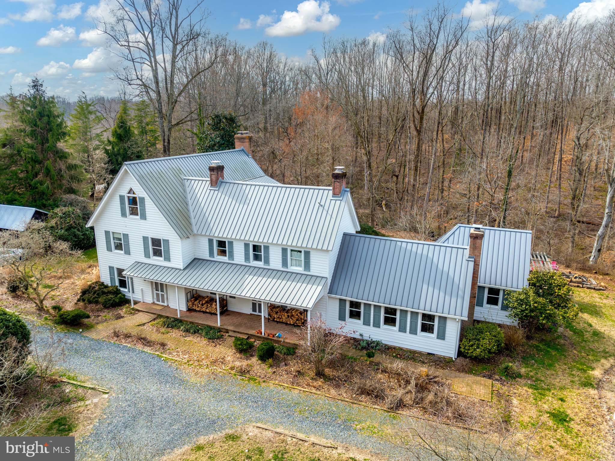 Welcome to a piece of Americana, nestled on 28.5 acres of picturesque land, where the charm of yesteryear meets modern luxury. The original home was believed to be built in the 1870's, with a major renovation and expansion taking place in 1990.  This spectacular farmette boasts over 5000 square feet of meticulously maintained space, offering a harmonious blend of heritage and contemporary living.  The previous owner hired special craftsmen and brought materials to create the addition to match the 19th century farm house.  It flows seemlessly. 

Escape the hustle and bustle of city life and immerse yourself in the tranquility of rural living. Surrounded by rolling hills and lush greenery, this property provides an idyllic retreat for those seeking peace and privacy. Whether it's morning coffee on the porch or evening strolls through the expansive grounds, every moment here is a celebration of nature's beauty.

Step inside to discover a residence that exudes character at every turn. From the grandeur of the spectacular home that boasts  warm living spaces, every detail reflects a bygone era of craftsmanship and elegance. Yet, don't let the historic charm fool you—modern amenities seamlessly integrate with the traditional architecture, offering the best of both worlds.

With 5 bedrooms and 4.5 bathrooms, including an separate in-law or aupair suite, there's ample space for family and guests to unwind and rejuvenate. Each room is thoughtfully designed to provide comfort and functionality, ensuring everyone feels right at home. From cozy fireplaces to sunlit reading nooks, every corner invites you to relax and indulge in the simple pleasures of life.

Step outside to explore the expansive grounds that define this extraordinary property. Whether you're a nature enthusiast, an avid gardener, are looking for place for horses or simply enjoy outdoor recreation, there's something for everyone here. From sprawling lawns to tranquil woodlands, the possibilities are endless—create your own oasis and let your imagination run wild.

Despite its rural setting, convenience is never far away. Situated within easy reach of amenities, schools, and major highways, this property offers the perfect balance of seclusion and accessibility. Whether you're commuting to DC or Annapolis,  everything you need is within reach.

Don't miss this rare opportunity to own a piece of colonial America and create memories that will last a lifetime. Whether you're seeking a weekend retreat, a family estate, or a unique investment opportunity, this historic farmette is sure to captivate your heart and imagination. Schedule your private tour today and experience the magic for yourself!