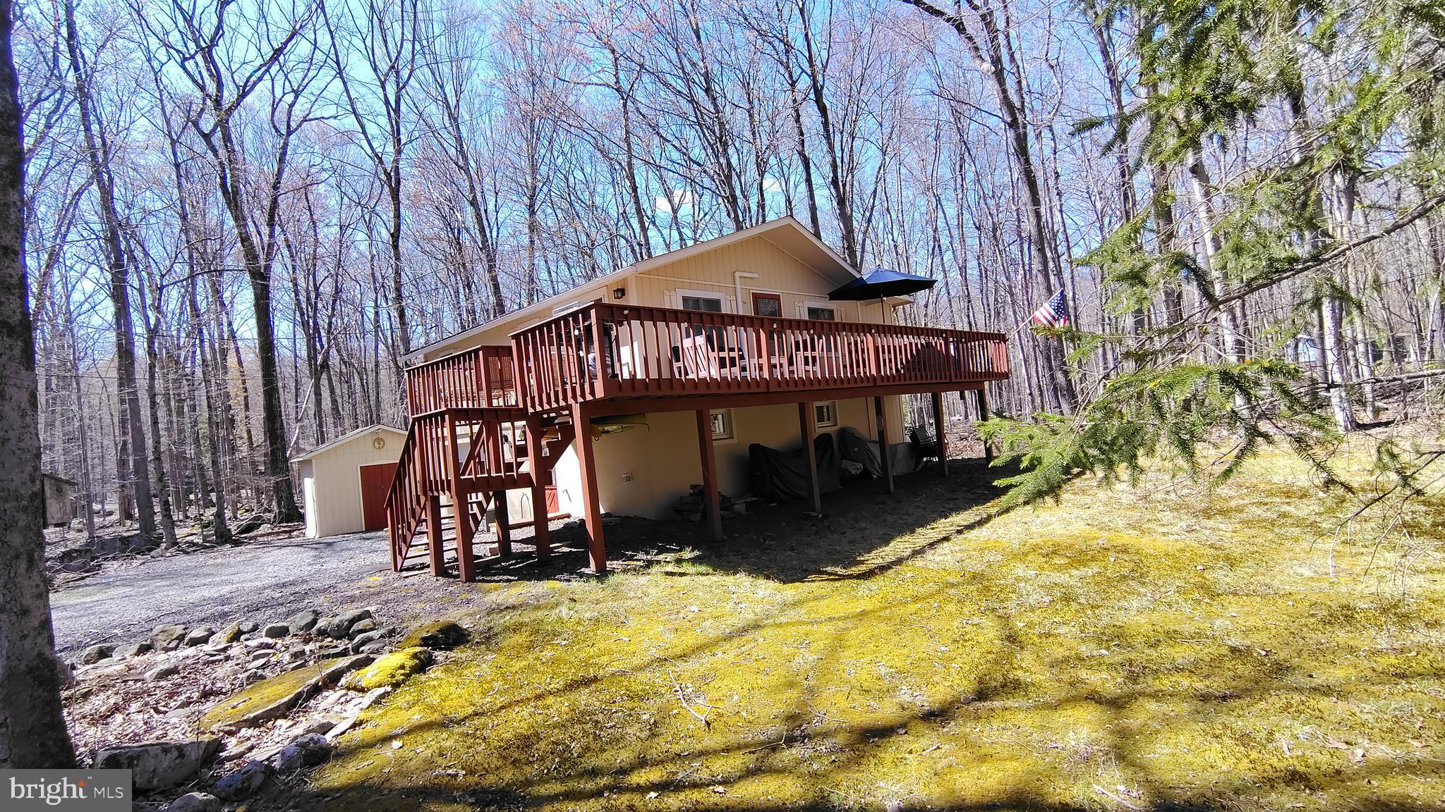 Welcome to 249 Selig Rd, nestled in the highly desirable Locust Lake Village an award-winning community in Pocono Lake, PA. This charming 3-bedroom, 1.5-bath home offers the perfect opportunity for a relaxing vacation retreat or a comfortable full-time residence. Surrounded by the natural beauty and serenity of the Poconos, this home invites you to unwind and enjoy every season. A spacious wraparound deck provides the ideal setting for morning coffee or evening gatherings, while the finished lower level adds extra living space for entertaining or relaxing. With nature as your backdrop and endless nearby attractions to explore, this home truly captures the essence of Pocono living. Come experience it for yourself—you may just find it’s exactly what you’ve been looking for. measurement approx. Make your appointment today