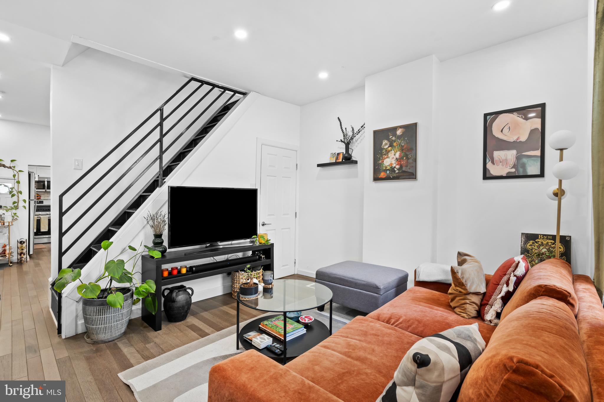 Welcome to 2170 E Oakdale Street, a beautifully renovated 2-bedroom, 1.5-bath rowhome located in the heart of booming East Kensington. This move-in ready home blends modern finishes with functional city living, featuring wood flooring throughout and a spacious main level designed for both everyday comfort and entertaining. The first floor offers a bright living area that flows seamlessly into a large formal dining room, creating an ideal layout for hosting and daily living alike. Just beyond, the stylish kitchen is outfitted with white shaker cabinetry, quartz countertops, stainless steel appliances, and ample storage space. A conveniently located rear powder room and first-floor laundry area add to the home’s overall functionality.

Step outside to a spacious, fully fenced rear yard, perfect for grilling, entertaining guests, or creating your own private outdoor retreat. Upstairs, you’ll find two well-sized bedrooms and a thoughtfully renovated full bathroom featuring white porcelain tile paired with gray clementine tile accents for a clean, modern aesthetic. The second level also offers an additional outdoor living space with a large rear deck overlooking the rear yard below.

Ideally situated just steps from Frankford Avenue, this home places you in the center of one of Philadelphia’s most exciting and rapidly growing neighborhoods. Enjoy close proximity to local favorites including Philadelphia Brewing Company, Meetinghouse, Fiore, Emilia, Circles and Squares, Korea Taqueria, OG Pizza, and Rowhome Coffee. The location also offers easy street parking, quick access to public transit via the Market–Frankford Line at Huntingdon Station, and convenient commuting access to I-95 and major roadways. Don't miss a perfect opportunity to own a turnkey home with multiple outdoor spaces in one of Philadelphia’s fastest-growing neighborhoods.