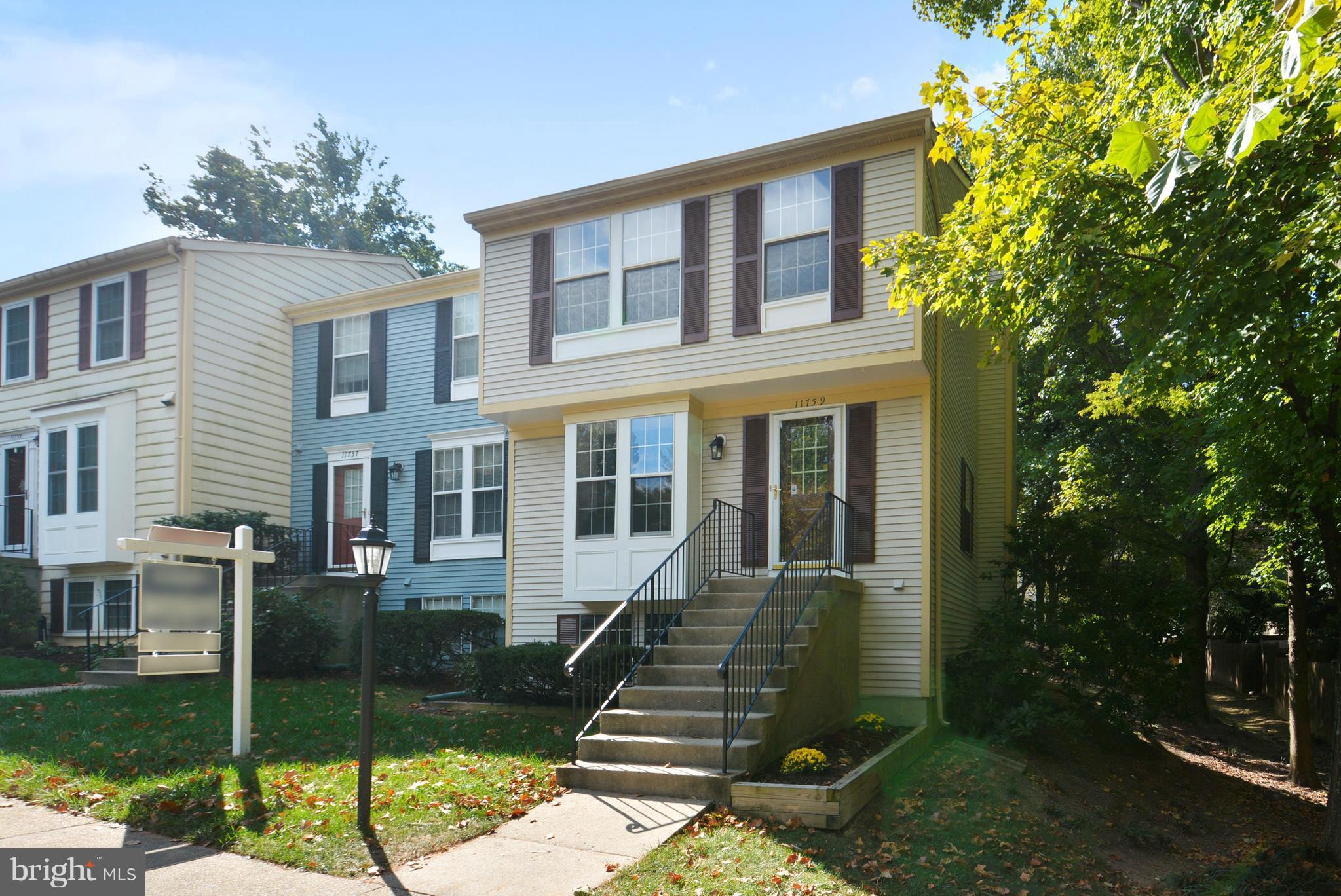 Fully renovated end townhouse in prime North Reston location. All new kitchen and stainless appliances, granite too! New hardwoods on main just installed. Bathrooms updated. New french doors to large deck and fenced yard backing to treed common ground. Three finished levels, walkout rec room with fireplace. Large utility/laundry room.