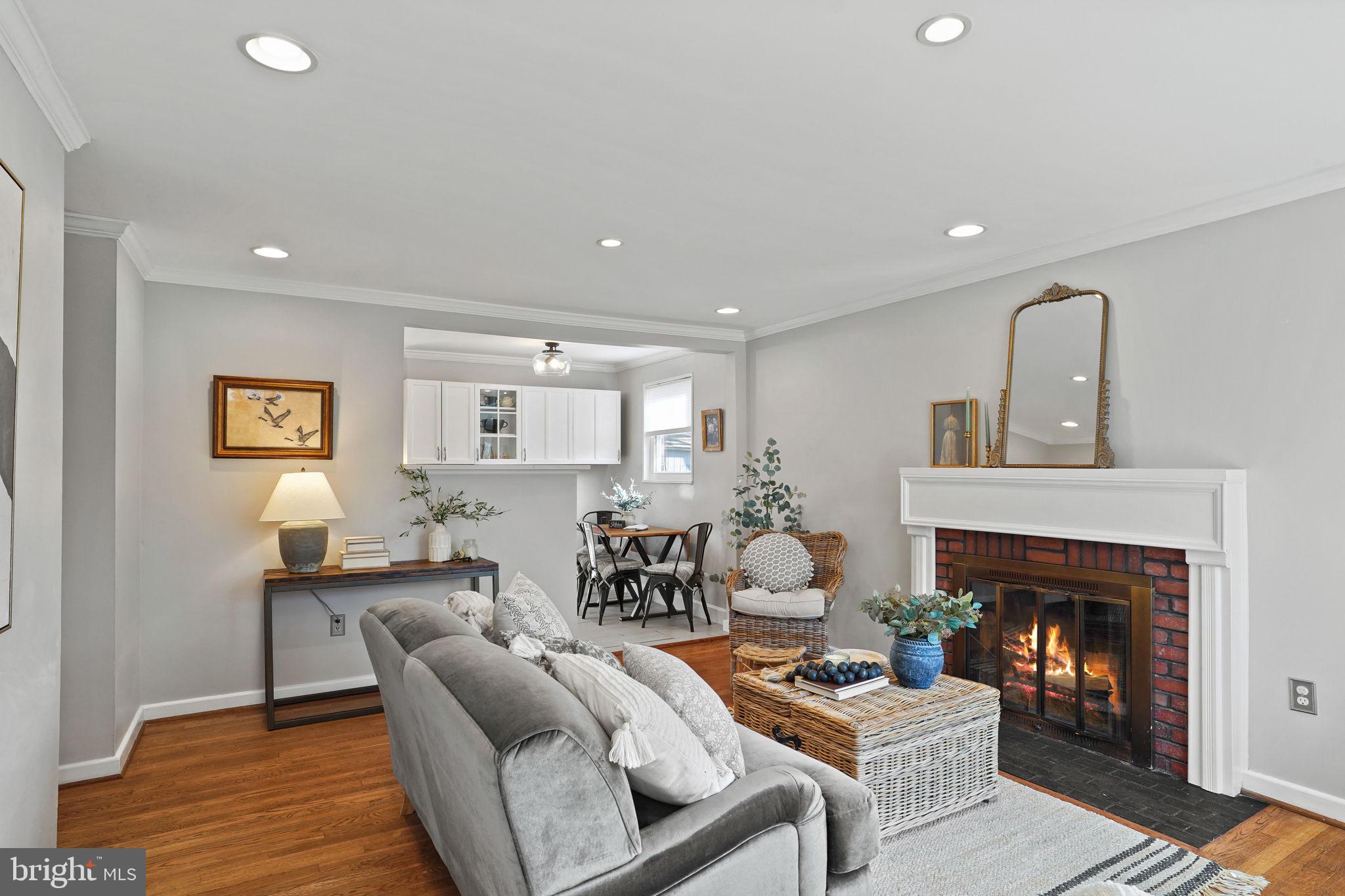 Nestled in a highly desirable spot just moments from historic Old Town, this Alexandria residence exudes both charm and practicality. With a location offering quick access to the Metro (under 1.5 miles away), Reagan National Airport, the Pentagon, and downtown DC, exploring and commuting around the region is a breeze. *Inside, you'll find a brilliant main level that welcomes you with gleaming hardwood floors, a lovable living room featuring a fireplace, three inviting bedrooms, and a full bathroom. Recent updates include a reconfigured wall between the kitchen and living room for a more open layout and sleek new quartz countertops. Fresh paint and modern light fixtures complete this move-in-ready space. *The finished basement further extends the living area with a generous recreation room adorned with custom wood-paneled walls, an adaptable bonus room that could serve as a home office or an extra (non-conforming) bedroom, an additional full bathroom, and ample storage and flexible space. *Outside, enjoy the fully fenced front yard outlined by classic black iron fencing, a secluded back patio complete with a fire pit perfect for gatherings, and a storage shed for your bikes or lawn equipment. The driveway comfortably accommodates 2-3 cars, ensuring stress-free parking. *Seize the chance to claim this delightful home as your own!