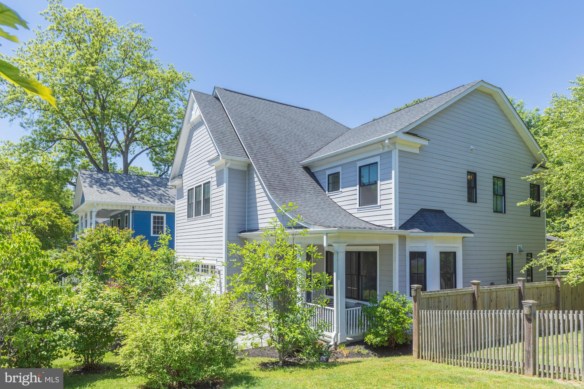 *** Drop by and take a look around! Join us for our Open House on Saturday 6/6, 1:00pm - 3:00pm *** Nestled on a tree-lined street in Takoma’s Silver Spring Park, this move-in ready 5BR/5.5BA custom home, built in 2017, blends timeless charm with modern finishes. From picture molding and sliding barn doors to whimsical wallpaper and soaring ceilings - every room offers something "special"!

The chef’s kitchen features crisp white shaker cabinetry, brass hardware, quartz countertops, herringbone backsplash and dramatic navy center island. Premium stainless appliances include a Wolf gas range, sculptural hood, double wall ovens and hidden microwave.  The oversized walk-in pantry is conveniently tucked off the  butler’s wine bar leading to the light filled formal dining room.

The open-concept family room with stone rare to find WOOD BURNING Fireplace with convenient gas started that overlooks the peaceful backyard, while the breakfast area opens directly to an inviting screened porch with vaulted beadboard ceilings — the perfect setting for morning coffee, al fresco dinners, or relaxed gatherings just off the kitchen.

Upstairs, ensuite bedrooms each with private baths provide comfort and privacy for all.   The luxurious owner’s retreat offers dual walk-in closets, custom window treatments and a spa-inspired bath with separate vanities, and rare to find *Bain Ultra* (non bacterial) jacuzzi soaking tub and walk in glass shower.   The main room has lux extras including tray ceiling, center chandelier and power blinds for ultimate sleep success.   Upper level laundry unlike spec homes offers L-shape kitchen like cabinets with folding counters completing the second floor.

The fully finished lower level offers exceptional flexibility with a private guest suite and full bath, large family room, music lounge/speakeasy retreat, dedicated workstation, fitness area, and sauna space — creating the perfect extension for entertaining, working from home, guests, or everyday relaxation.

Outside, enjoy a fully fenced backyard with generous green space for play, pets, or entertaining, anchored by a welcoming screened porch and grilling patio that create seamless indoor-outdoor living.

Ideally located just moments from Downtown Silver Spring, Takoma Park, Metro access, parks, dining, and shopping, this exceptional home offers the perfect blend of character, comfort, and convenience.

***Zone 33 school - pick Elementary School / Takoma Park Middle School / Montgomery Blair High School - both offer MCPS Magnet Programs***