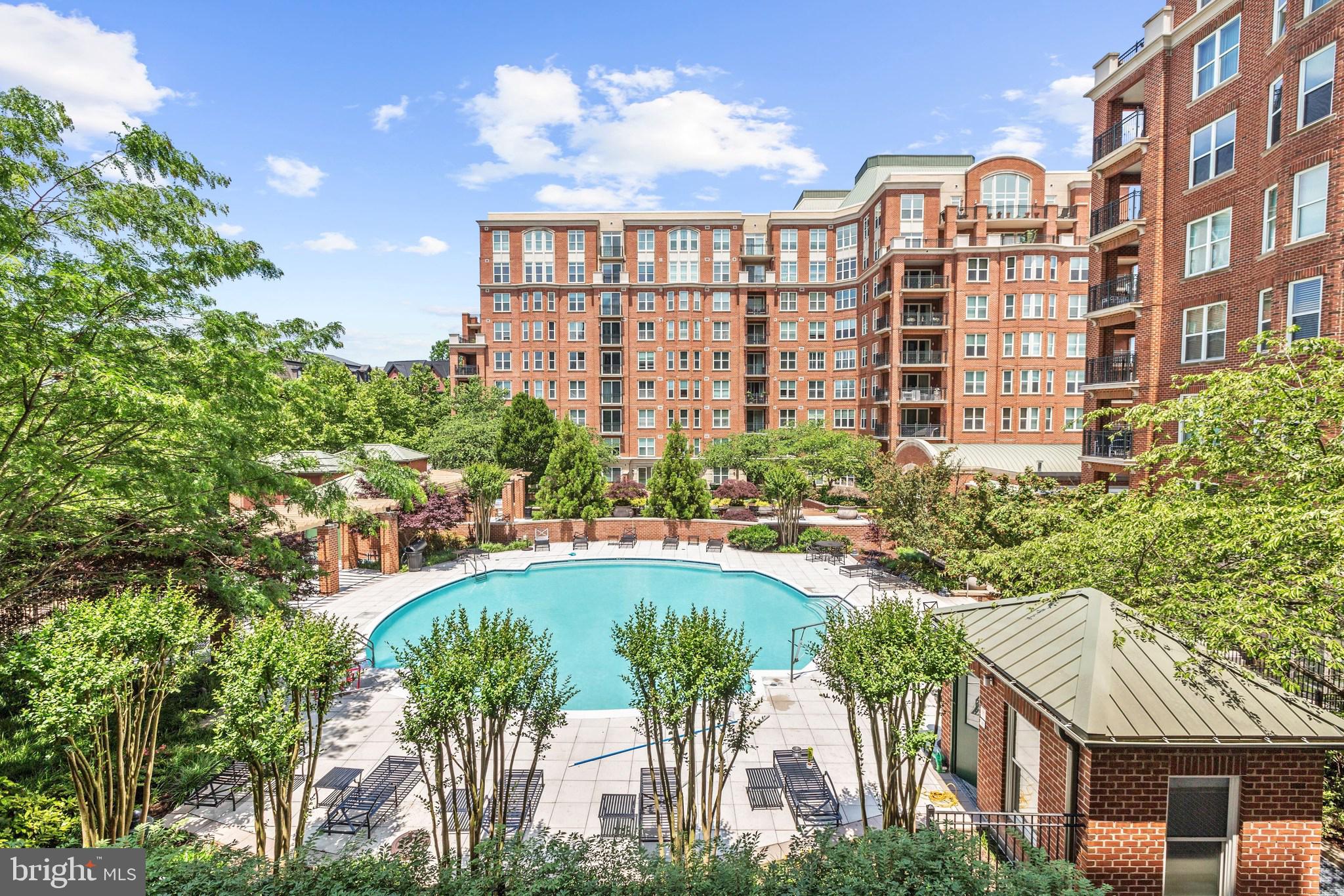 Elegance awaits you in this sun-drenched South Tower corner PENTHOUSE (only one of two) with POOL and verdant garden views. Incredible living and entertaining space with 10 to 17+feet ceiling heights throughout 1007S. The freshly painted sought-after Waterford model is treasured for its spacious 3250  plus footprint and offers  a 37’ x 7’ balcony with panoramic views ! Why is this unit extra special? It’s the perfect combination of elegance and convenience and includes THREE bedrooms, THREE full bathrooms PLUS powder room, PLUS a LARGE DEN/HOME OFFICE and a cozy electric fireplace which is a rarity and a highly desired feature at Park Potomac Place. The new Buyer will enjoy the large table-spaced chef’s kitchen with adjoining family  living area. The light filled kitchen features Viking appliances including a gas cooktop, wall ovens and microwave (2024) and a Subzero refrigerator, kitchen island and abundant storage and counter space for large scale entertaining. The walk-in primary bedroom closets are massive and the largest at Park Potomac Place. All bedrooms are ensuite with private bathrooms. A true laundry room completes the perfect home for downsizing at Potomac’s NUMBER ONE condo community.  The unit is ideal for extended hospitality guest entertaining and in house care as the two guest suites are located on the opposite wing  from the primary living quarters.  The unit has two zoned heating and cooling. TWO generous GARAGE Parking spots AND an enclosed private storage room conveniently located INSIDE the building on the lobby level convey. Why is Park Potomac Place the finest of all condominium buildings in the DMV? It is the best managed full-service establishment which provides its residents with 24-hour concierge, on-site management, building engineer, porter service, professionally landscaped grounds and hardscape, elegant clubroom with catering kitchen, private courtyards and grills, an outdoor pool, fitness center, guest suites, and guest parking and shared EV charging stations…..and the one of the lowest condo fees of the luxury buildings in DMV area. Residents enjoy the convenience of a great collection of retail businesses, gourmet coffee shops, banks, grocers, pharmacy, and the best dining establishments of Potomac including Founding Farmers, Gringos & Mariachis, the new popular King Street Oyster Bar, Attman’s Deli, Brooklyn’s Deli, O’Donnell’s Fish Market, Yirasai Sushi, Pama Thai and the Coming Soon Gregorios; with direct access to I-270 and commuter routes to Bethesda, Downtown DC, Virginia and three international airports! Look no further…the best living in Potomac…and maybe all of the DC metropolitan area! This is the PENTHOUSE everyone has been waiting for!