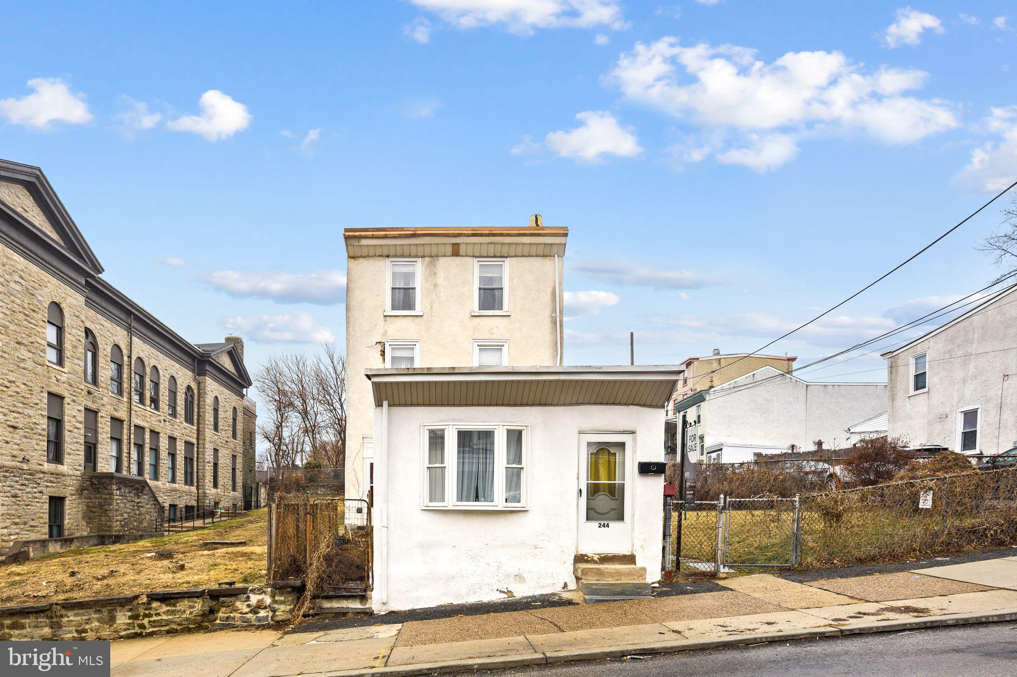 ++ MOTIVATED SELLER  ++ 
Exciting investment opportunity located in Manayunk. This original corner home, built in 1900, offers significant potential for the right buyer.

The property features a spacious layout including five bedrooms and three full bathrooms. The main living areas consist of a large living room, a dining room, and an eat-in kitchen. Additionally, the home includes a separate living space with its own entrance, bedroom, bathroom, kitchen, and separate gas and electric meters. The exterior offers a patio area and beautiful green space.

Please note the following details regarding the sale:

- Inclusions: All appliances (in as-is condition) and select furniture (no monetary value).
- Exclusions: The seller's personal belongings.

While the house requires some work, it is a well-loved home that can be updated to become a dream residence or a high-value rental.