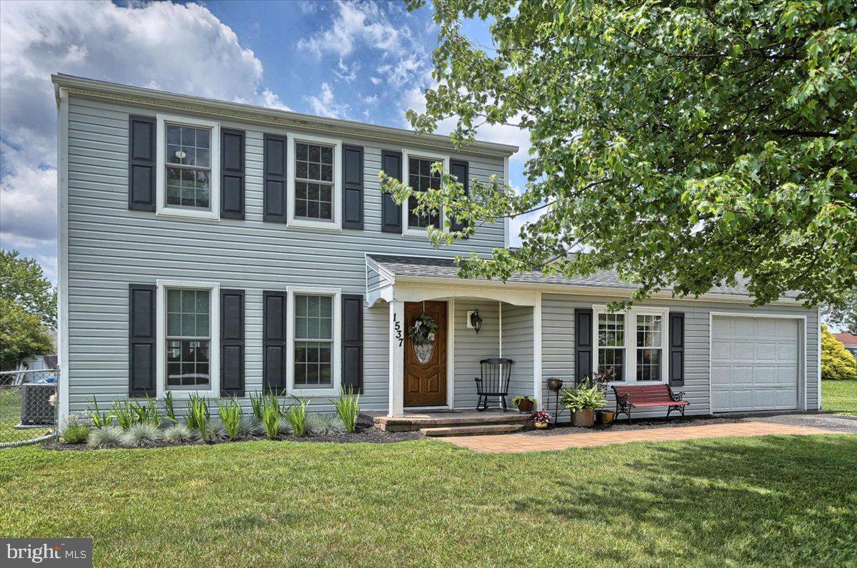 This home is "THE ONE". Quiet neighborhood, tons of updates, fenced in yard, and pristine condition.... Schedule your showing of this beautiful, Susquehanna Twp., 2-story home with an attached garage.  So many updates over the last 10 years, including; Renewal by Andersen windows, New Heat Pump/Central AC, new flooring throughout the house, new siding, gutters, shutters and downspouts, new doors (front and back slider) custom trim work and shades, and reinsulated throughout for heating and cooling efficiency. Some of the other things I love about this home; 1st floor living room AND family room, attached garage, beautiful landscaping, "rocking chair" front porch, deck, and fencing for the pets and kids! Schedule a showing today before it is gone!