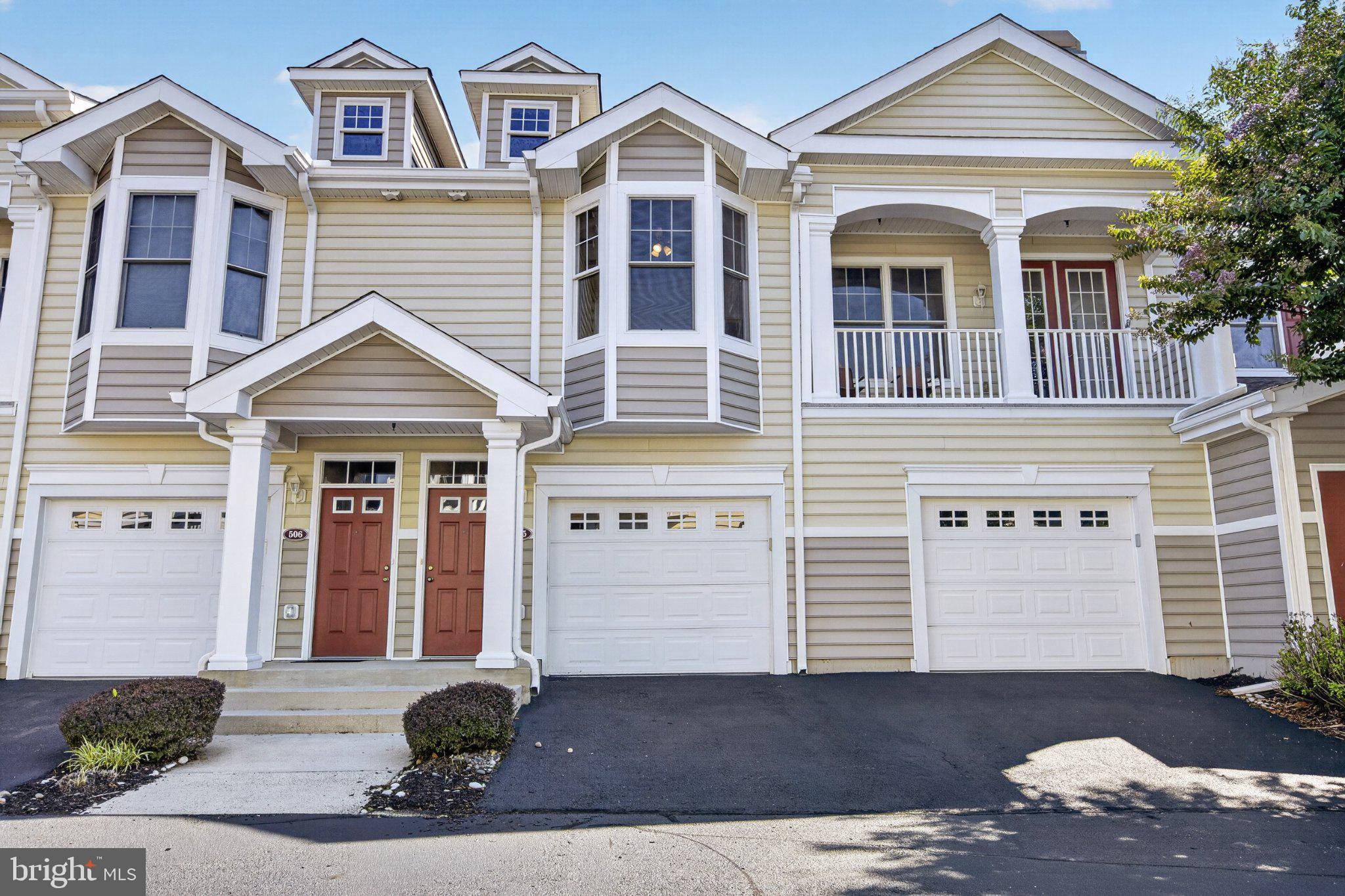Back on the Market but with a new price! Location says it all here: this 2-bedroom, 2-bathroom home sits inside Paynters Mill, one of the area's most amenity-rich communities, with Lewes Beach, Cape Henlopen State Park, and downtown Lewes and Milton all just a short drive away. This two-story property welcomes you upstairs with cathedral ceilings and a wall of natural light that carries through the great room, anchored by a gas fireplace for cooler evenings. Granite counters and generous cabinet space make the kitchen easy to work in, and the pass-through to the dining area keeps things open for entertaining. Slide open the door to your private balcony for a quiet view over the community. The primary suite includes a walk-in closet and its own full bath, and the second bedroom sits on the opposite side of the unit for privacy when guests stay over.
What sets this home apart, though, is what's outside the front door. Paynters Mill is built around its Georgian-style manor clubhouse, home to a fitness room, library, and gathering spaces for residents. The outdoor pool stretches 75 feet with a full sundeck, and sports courts cover tennis, pickleball, and basketball. Nearly two miles of paved paths loop past ponds and flowering trees, with a quarter-mile track and outdoor exercise stations built in along the way. The village green at the heart of the neighborhood adds even more space to relax outdoors, right alongside the manor house and pool. Grab a bite at Abbott's Grill or one of two other on-site restaurants, book a haircut, or drop into the yoga studio — all without getting in the car.
This is coastal Delaware living with the work already done for you. Schedule your showing today.