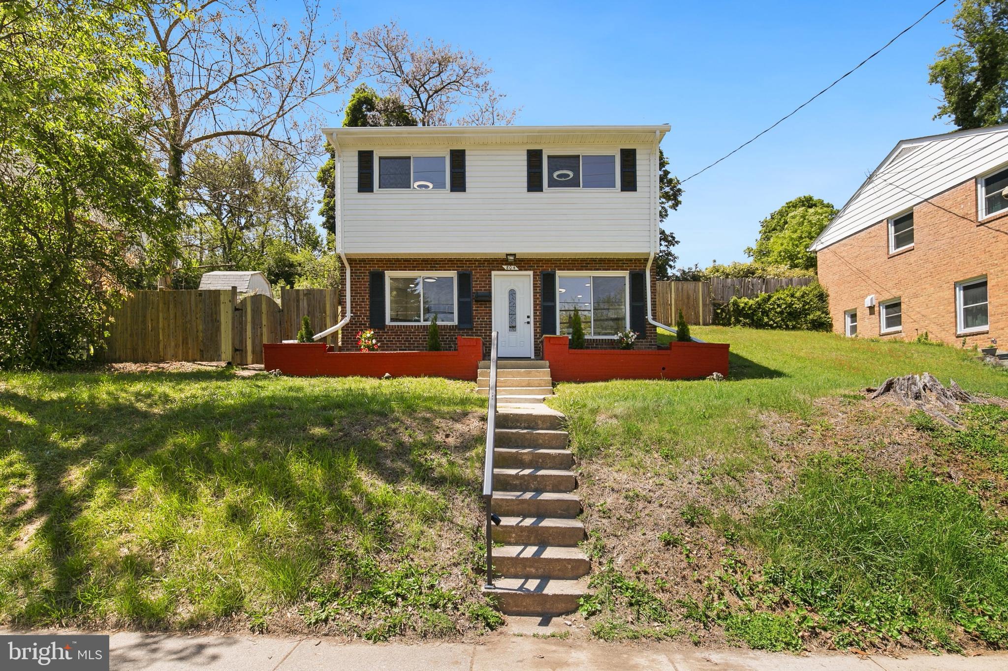 Leave the car at home—less than 1 mile to Rockville Metro, MARC Train, Amtrak, and Rockville Town Center!  Now offered at a can’t-miss new price, this fully renovated Rockville home offers the walkable lifestyle today’s commuters are looking for. Renovated in 2026 with bright, modern finishes throughout, the main level features comfortable living and dining space, an eat-in kitchen with access to the side yard, a full bath, laundry, and under-stairs storage. Upstairs you’ll find three bedrooms and a second full bath, plus access to a brand-new composite wood deck overlooking a fully fenced backyard. The outdoor space offers a low-maintenance lifestyle with room for pets, play, gardening, or future landscaping enhancements such as terraced planting beds or attractive ground cover (see virtually staged picture). Enjoy outdoor living from the deck while keeping weekend yard work to a minimum, and take advantage of the storage shed for all your tools and gear. NO HOA. Minutes from I-270 and nearby shopping and dining, this home is a great fit for buyers who want turnkey living in a prime location. No driveway, but street parking is available—schedule your showing ASAP.