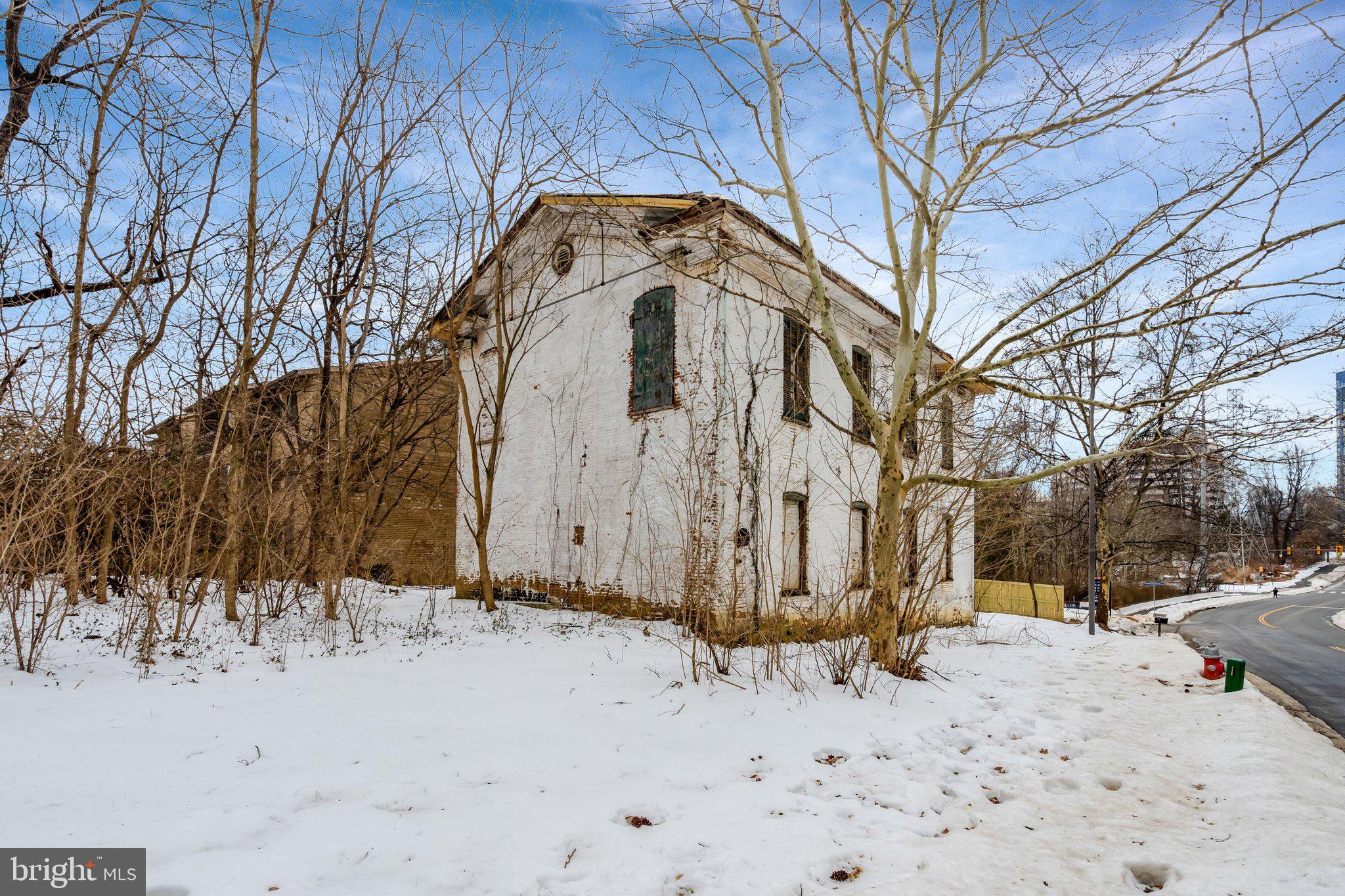 Rare opportunity to acquire a historic property situated on 0.23 acres in the heart of Reston. Built in 1892, this distinctive property offers timeless character and exceptional potential for the right buyer. Significant rehabilitation is required, presenting a unique chance to restore and reimagine a piece of local history.

An existing historic structure remains on the lot and must be preserved externally. The property was previously approved for condominium development; however, buyers are responsible for conducting their own due diligence regarding zoning, approvals, and future use.

For safety reasons, please do not enter the building.