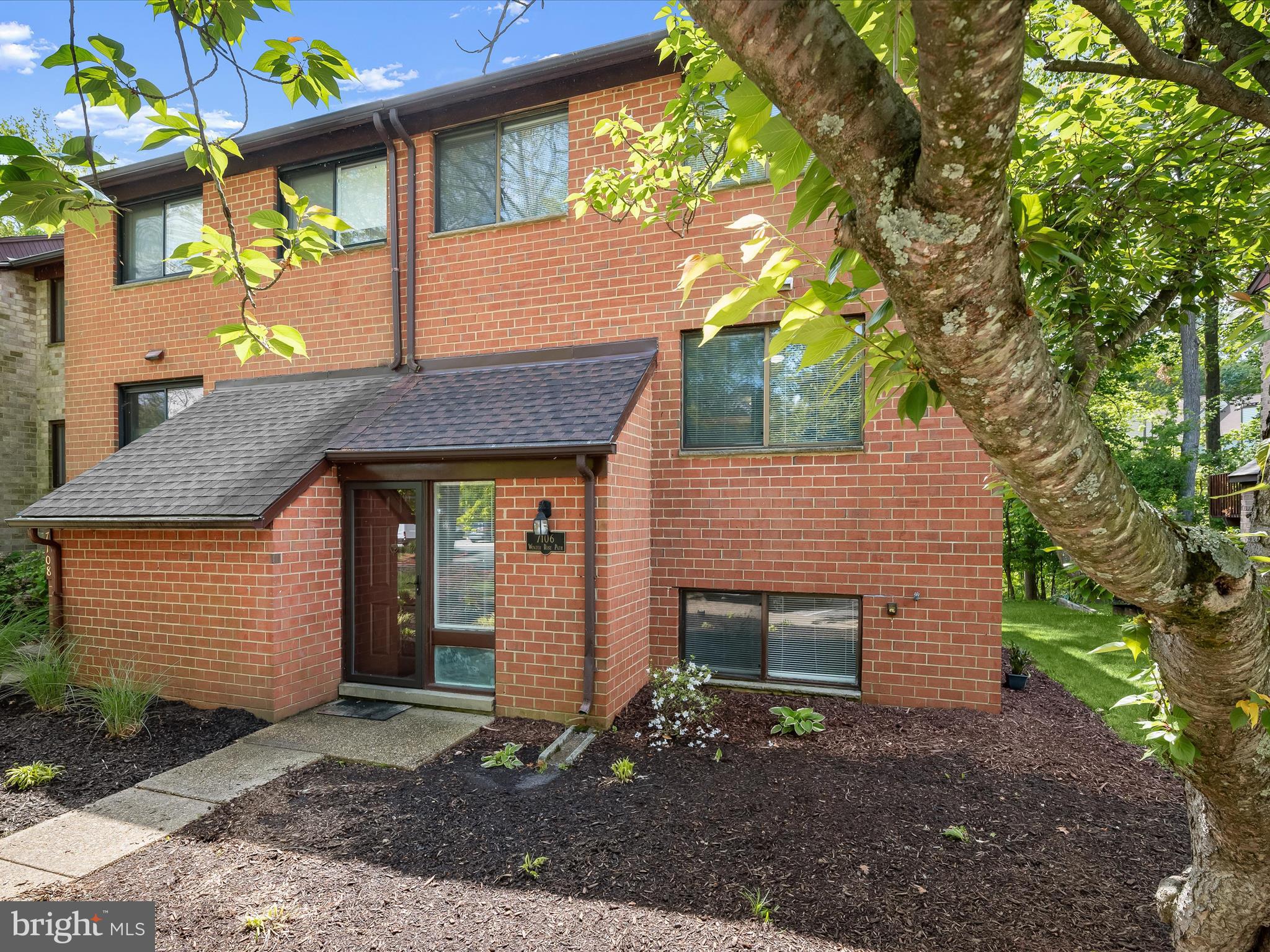 The seller has set an offer deadline for highest & best offers by Sunday, May 10th at 5pm. This spacious end-of-row townhome impresses with modern updates throughout, including a brand-new roof, upgraded flooring, fresh paint,  and beautifully renovated bathrooms.  Step inside to a bright and airy open floor plan featuring cherry hardwood flooring, recessed and statement lighting, and generous living and dining spaces offering deck access, perfect for entertaining. The eat-in kitchen is a chef’s delight, offering granite countertops, stainless steel appliances, and a cozy breakfast nook.    Upstairs, cherry hardwood floors continue through all three bedrooms. The spacious primary suite includes 2 closets and a stylish en suite bath adorned with marble-look tile.  The fully finished lower level expands the living space with a fourth bedroom, a full bath, and a walkout family room showcasing a rustic stone-surround wood-burning fireplace and direct access to the backyard patio.  Enjoy outdoor living with an expansive deck and a custom stone patio within the privacy-fenced backyard, ideal for relaxing or hosting guests.  Ideally located in the heart of vibrant Columbia, with easy access to major commuter routes and just minutes from shopping, dining, and endless entertainment options.