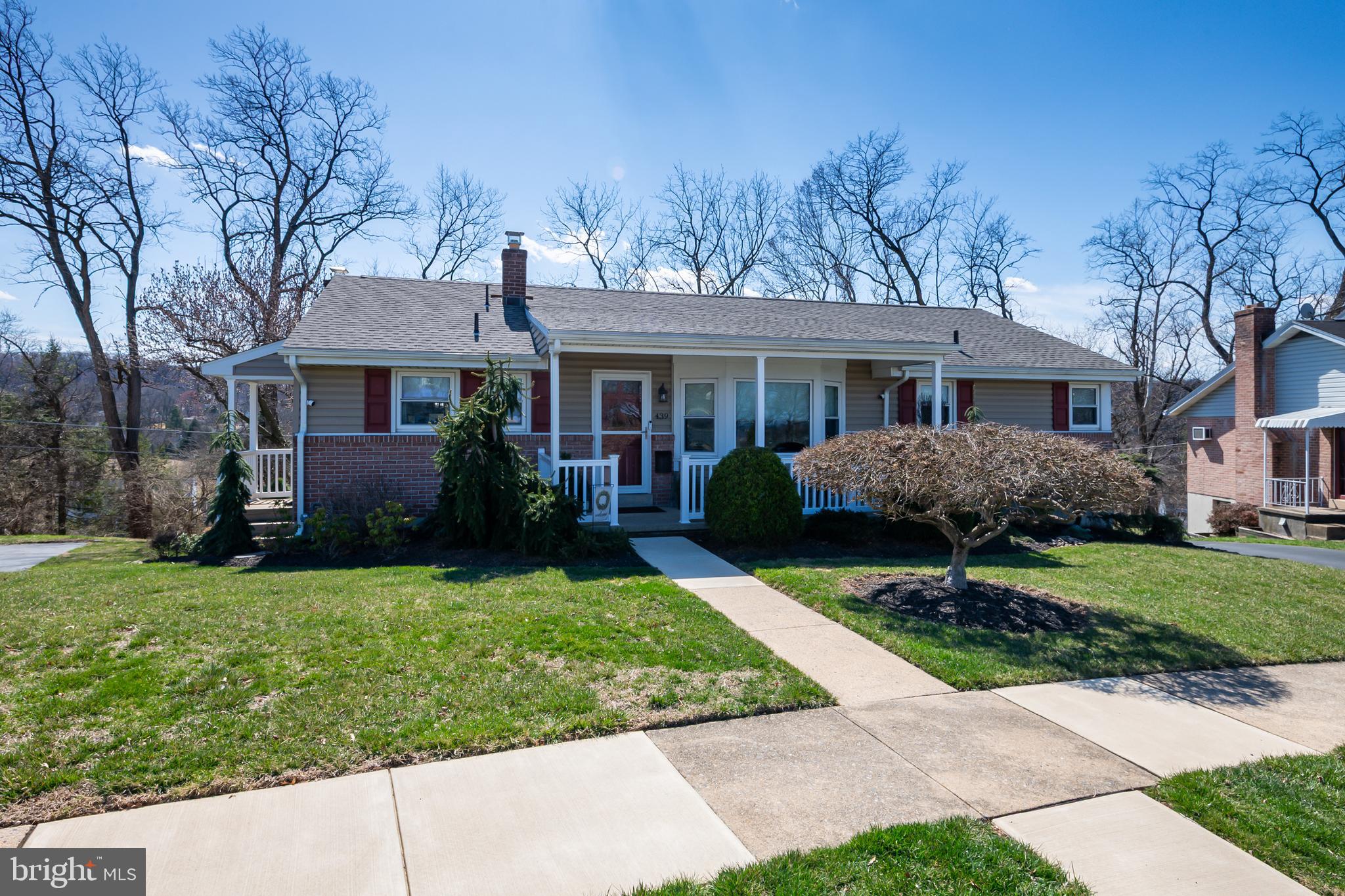 This beautifully remodeled brick and vinyl ranch in the Governor Mifflin School District is a true gem! With 3 bedrooms, 1 ½ baths, and 1,800 square feet of total living space, this home offers plenty of room for everyone. The large .26-acre lot provides a great outdoor area, and the covered front porch is perfect for relaxing and enjoying the view.  As you step inside, you'll be greeted by a spacious living room featuring hardwood floors and a charming bay window. The kitchen is a highlight with its tile flooring, included appliances, and peninsula that offers extra seating. It also connects seamlessly to the dining room, which also has beautiful hardwood floors. Also, on this floor, is a convenient powder room.  All three bedrooms are generously sized and located on the main level, along with a spacious remodeled full bath.  The huge, walk-out lower level features a recreation room with a cozy brick fireplace and wall-to-wall carpeting, perfect for gathering and relaxing. French doors lead to the private backyard and patio area, providing easy access to outdoor living.  Additionally, the lower level includes a large storage area and a laundry space (possible space for in-law quarters) . This home also offers a 2-car garage with a large driveway, providing ample parking space. With economical gas heat, professional landscaping, and easy access to shopping, schools (LaSalle Academy/playground is across the street) , restaurants, and major highways, this home is definitely a must-see!