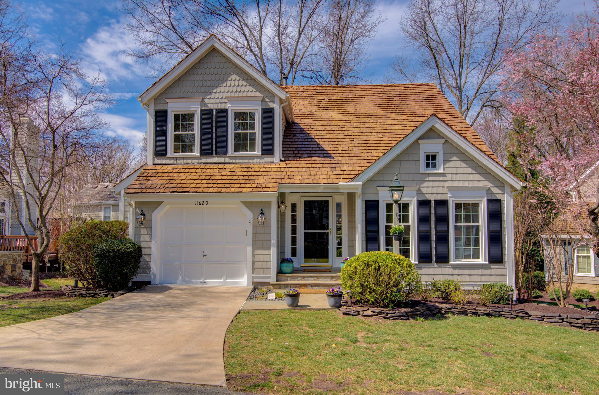 Open House CANCELLED - offer accepted. Charming and Updated Home with an Open Floor Plan in a Prime Reston Location
Nestled within an inviting cluster of homes, this beautifully updated residence offers a bright and spacious layout with hardwood floors on both the main and upper levels. Just around the corner from Reston's North Point Shopping Center, you’ll love the convenience of nearby restaurants, entertainment, and amenities.
Step inside to find soaring vaulted ceilings in the living room, an abundance of natural light, and freshly painted decorator’s white walls. The dining room is generously sized, making it perfect for hosting holiday gatherings. The stunning white kitchen features stainless steel appliances, granite countertops, a pantry, and a cozy breakfast nook with picturesque views of the expansive deck.
The adjacent family room is a warm and inviting space, complete with a wall of windows, a wood-burning fireplace, custom built-in bookshelves, and a glass door leading to the oversized deck—perfect for outdoor entertaining with built-in seating. A remodeled half bath, convenient laundry room, and access to the  garage  with cabinetry complete the main level.
Upstairs, hardwood flooring continues, leading to an airy open landing with a dramatic two-story overlook. The primary suite boasts vaulted ceilings, a walk-in closet, and a luxurious en-suite bath with a dual-sink vanity, soaking tub, separate shower, new skylight, and plantation shutters. Two additional bedrooms share a beautifully remodeled full bath.
The lower level walk-out offers incredible versatility with luxury vinyl plank flooring, a spacious recreation room, and two walk-in closets—ideal for storage or seasonal wardrobe changes. A legal en-suite bedroom with a remodeled full bath provides a private retreat, while a French door opens to professionally landscaped outdoor space.
Recent Capital Improvements: 2025: New cedar shake roof, new ​skylight in ​primary ​bathroom​, interior ​fully ​painted​, new ​hardwood ​flooring in ​kitchen​, new stove, new ceramic tile in laundry area, new light switches and outlets throughout home, new ceiling fan and light fixtures, carpet professionally cleaned in 2 bedrooms, exterior fully painted, deck sanded and stained, windows professionally cleaned, professional landscaping. 2024: remodeled upper level hall bathroom, remodeled main level half bathroom. 2022: new water heater, new washer and dryer. 2021: new concrete driveway. 2020: remodeled lower level full bathroom. 2016: remodeled primary bathroom. 2014: new flagstone front steps and walkway, new HVAC and gas furnace. 2013: new fireplace mantel and gas furnace. 2012: new windows. 2011: remodeled kitchen.
Unbeatable Location: Located just one block from Reston's North Point Center with shopping, dining and entertainment. Walk to pools, Tennis, tot lots, picnic areas, and Reston's scenic trails. Just two miles to Reston Town Center and minutes to Metro, Route 7, Toll Road, Greenway.
This home is a commuter’s dream with exceptional community amenities and modern updates throughout.