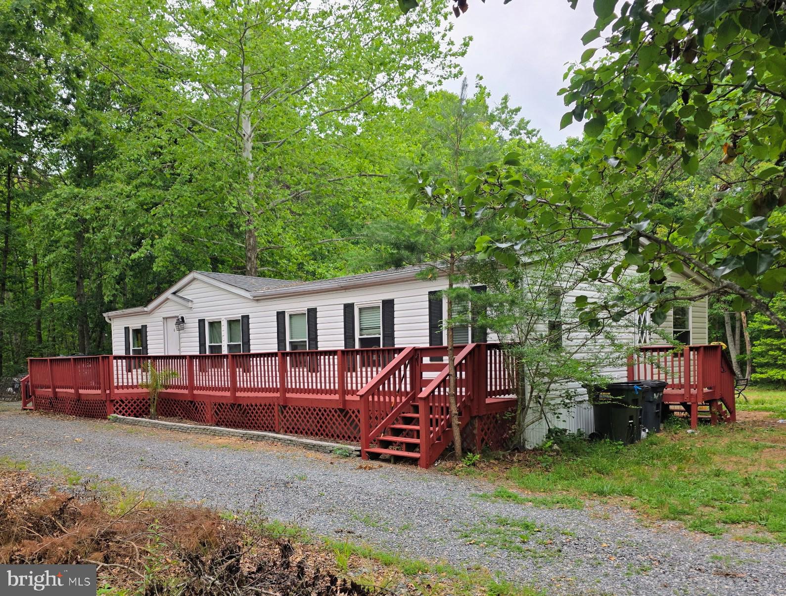 This Adorable Country Charmer is Priced to Sell!!!! 3 Bedrooms 2 Full Baths on 5 Beautiful  Acres and   Minutes to Lake Anna and Rt 3. This Home Offers 1344 Sqft of Living Space with an Open Concept Living/Kitchen and Dining, LVP Flooring, New Carpet in Bedrooms, Granite Countertops, Stainless Steel Appliances, and a Large Wrap-Around Front Deck to Sit and Watch the Sun Come Up or the Deer Run!!! Make Plans Now to See this Beauty Before its Gone !!!