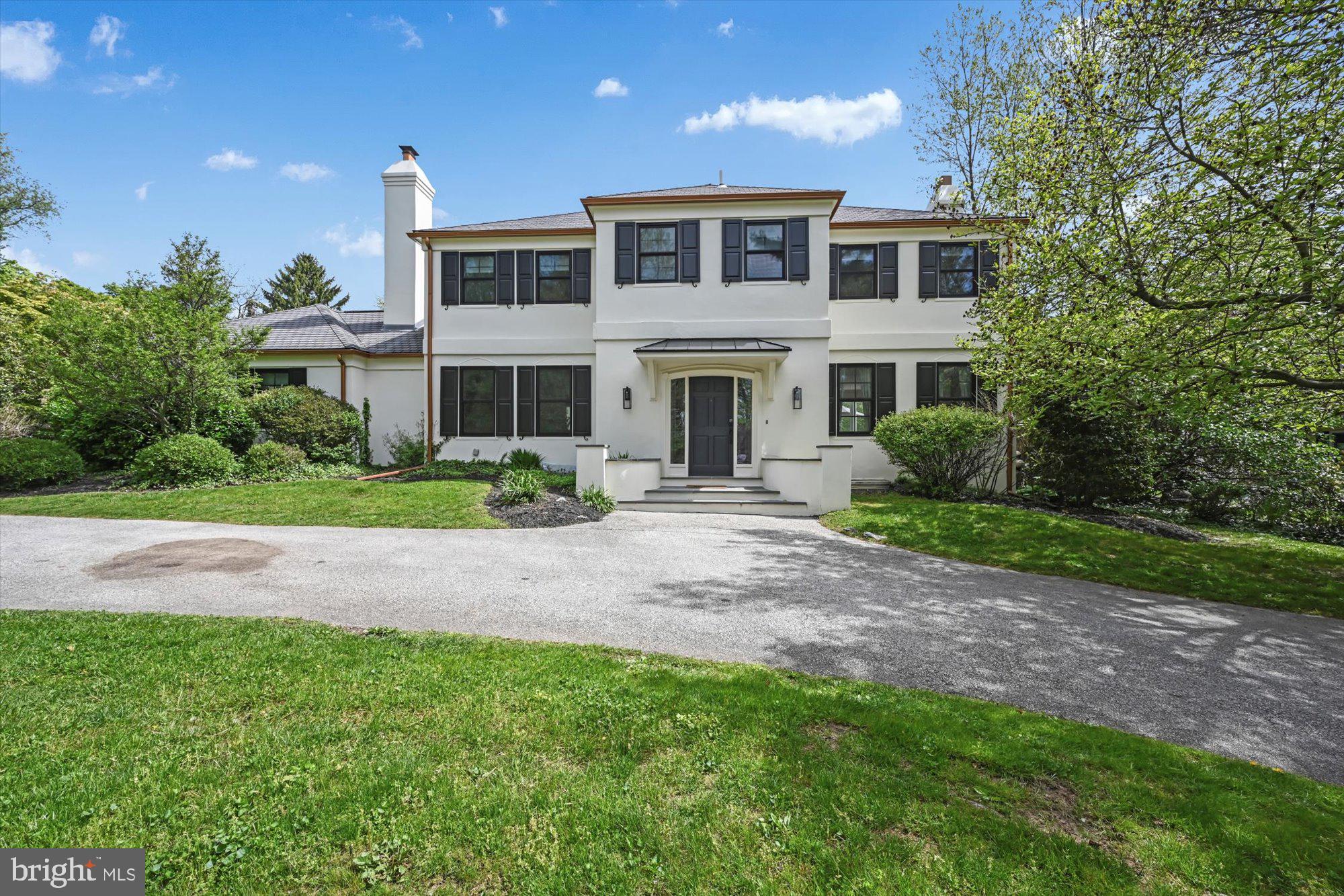 Come home to perfection! This wonderful sun filled 5 bed 3.5 bath custom colonial on one of Gladwyne's pristine streets is move-in ready for its new owner. Located within walking distance to the center of town, public park, elementary school, and private Montessori. This wonderful home is nestled on a secluded level lot that is three quarters +/- of an acre and surrounded by mature and beautiful landscaping. Formal living room complemented by beautifully finished hardwood floors, wood trim accents, a fireplace, and access to and a den and a sun room. The formal dining room has a second fireplace, and a view from the dining room into the fully renovated kitchen that is a dream come true. Some of the enhancements include generous counter space, high end appliances, two dishwashers, natural wood wrapped beams, upgraded lighting fixtures, and a wine cooler. More than ample cabinet and storage options can be found throughout the kitchen as well as built-in cubbies, an appliance cabinet, spice cabinet, and too may other elements to list here. The sun room flowing off of the kitchen has vaulted ceilings and a wall of windows overlooking the expansive yard. Beyond the kitchen you will find the newly built home office with its own entrance from the outside. Another wall of windows overlooks the yard and vegetable garden. Right off the kitchen there is a multi-level new bluestone patio complete with a separate “grill patio” so the grilling doesn’t interrupt the flow of entertaining. Relax in the inviting plunge pool that is ideal for cooling off on hot summer days. There is a private path in the back of the property that takes you straight into to the park where you will find tennis courts, playgrounds, baseball fields, and picnic areas. The first level of the home also includes a big laundry room with storage and a new powder room located in the entrance hall. Upstairs you will find four spacious and well lit bedrooms with ample closet space. The master bedroom has two walk-in closets with custom built-ins, as well as the master bathroom that was completely redone with custom marble tile shower and glass enclosure, soaking tub, double vanity, and more storage! There is also an additional full bathroom on the second level. The basement is fully finished and includes a large entertainment area, storage closets, the 5th bedroom and another fully updated bathroom. The house is fully wired with Sonos and multiple rooms have surround sound speaker systems. Close proximity to the major roadways gives you easy access up and down the Main Line and beyond. Showings to begin on May 12th 2022. All agreements to be presented by Monday the 16th at 3pm. Schedule a tour today!