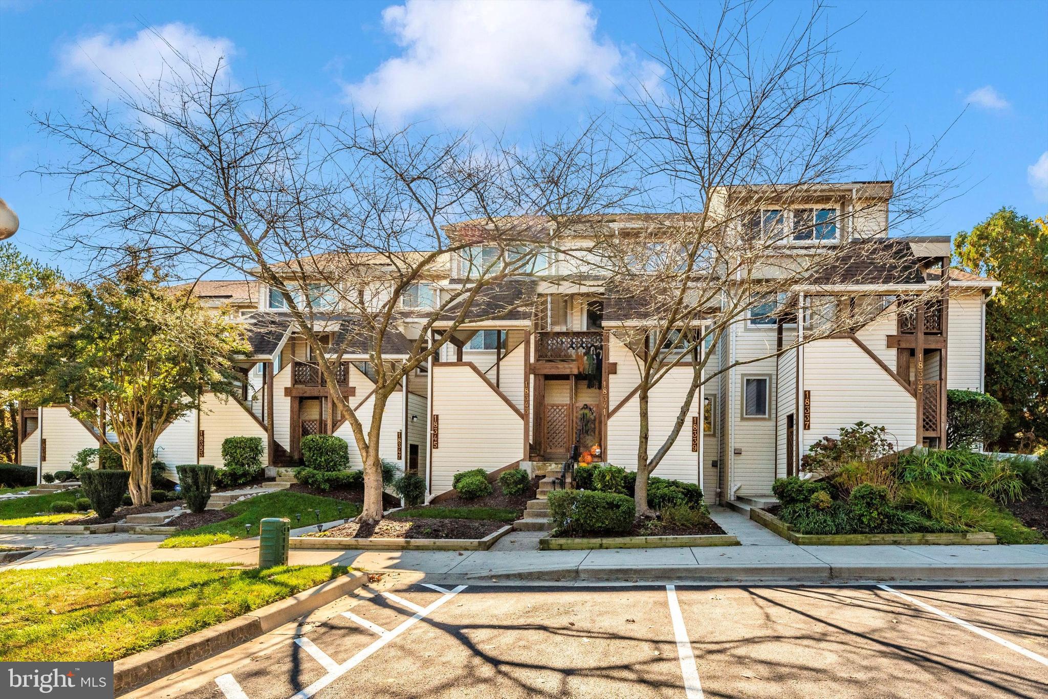 Discover this gorgeous ground-level condo in the highly sought-after Fair Hill community, showcasing stunning backyard water views! This move-in-ready 2-bedroom, 1.5-bath home blends comfort and modern style seamlessly.

Inside, you'll find an open-concept layout with a beautifully updated gourmet kitchen (2021) featuring quartz countertops, a stylish backsplash, modern fixtures, high-end GE Café appliances, and under-cabinet lighting. Adjacent to the kitchen is a bright dining area overlooking the cozy living room, complete with a wood-burning fireplace to add warmth and charm.  Additional updates include a new washer and dryer (2023), an updated HVAC system (2022), a water heater (2021), and a newer roof. 

Upstairs, the spacious primary and second bedrooms offer large windows, generous closet space, and an updated full bath. A conveniently located laundry closet completes the upper level for added ease.

Step outside to a relaxing patio—ideal for reading or entertaining—while enjoying peaceful surroundings with scenic walking paths and a private community pool.

With shops, grocery stores, restaurants, and easy access to the ICC just minutes away, this home offers unbeatable convenience. Don’t miss this rare opportunity!