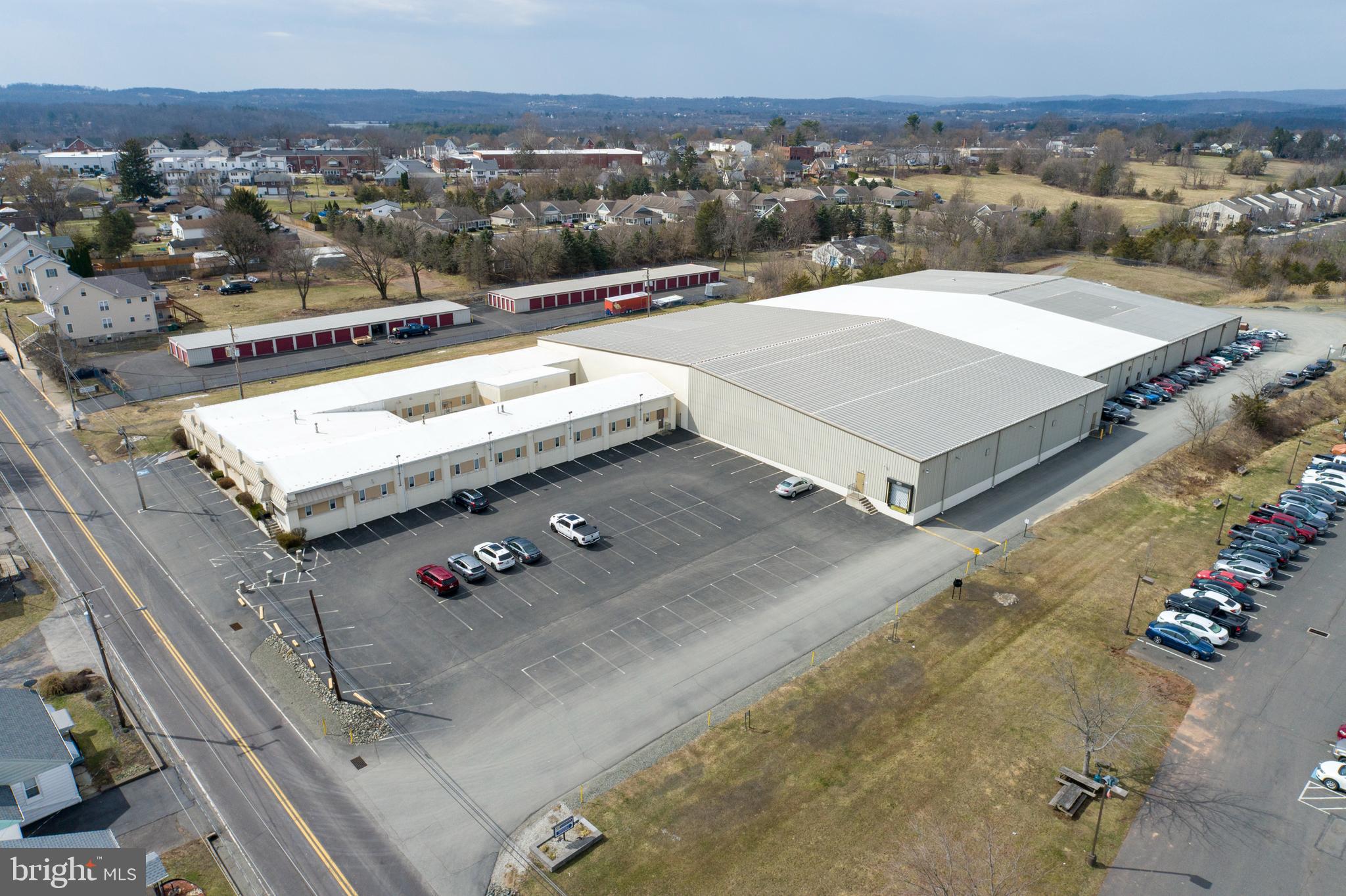 An 81,920 SF Industrial Building on 6+ acres. Zoning is Limited industrial (Upper Hanover Township). 13,325 SF of offices and 68,595 SF manufacturing/ warehouse space. 7 loading docks with levelers and 2 drive in doors. Built in 1920, 1988 and 1993. Public water and sewer. Column spacing  is 25 x 50 and ceiling heights are 16 feet to 22 feet. Three phase electric with 220/ 440 volt and 400 to 800 amps. Offices have heat and central air, manufacturing/ warehouse has gas radiant units. Internet provided by Verizon and Comcast. Approximately 7 miles to Northeast Extension of the Pennsylvania Turnpike (I-476).