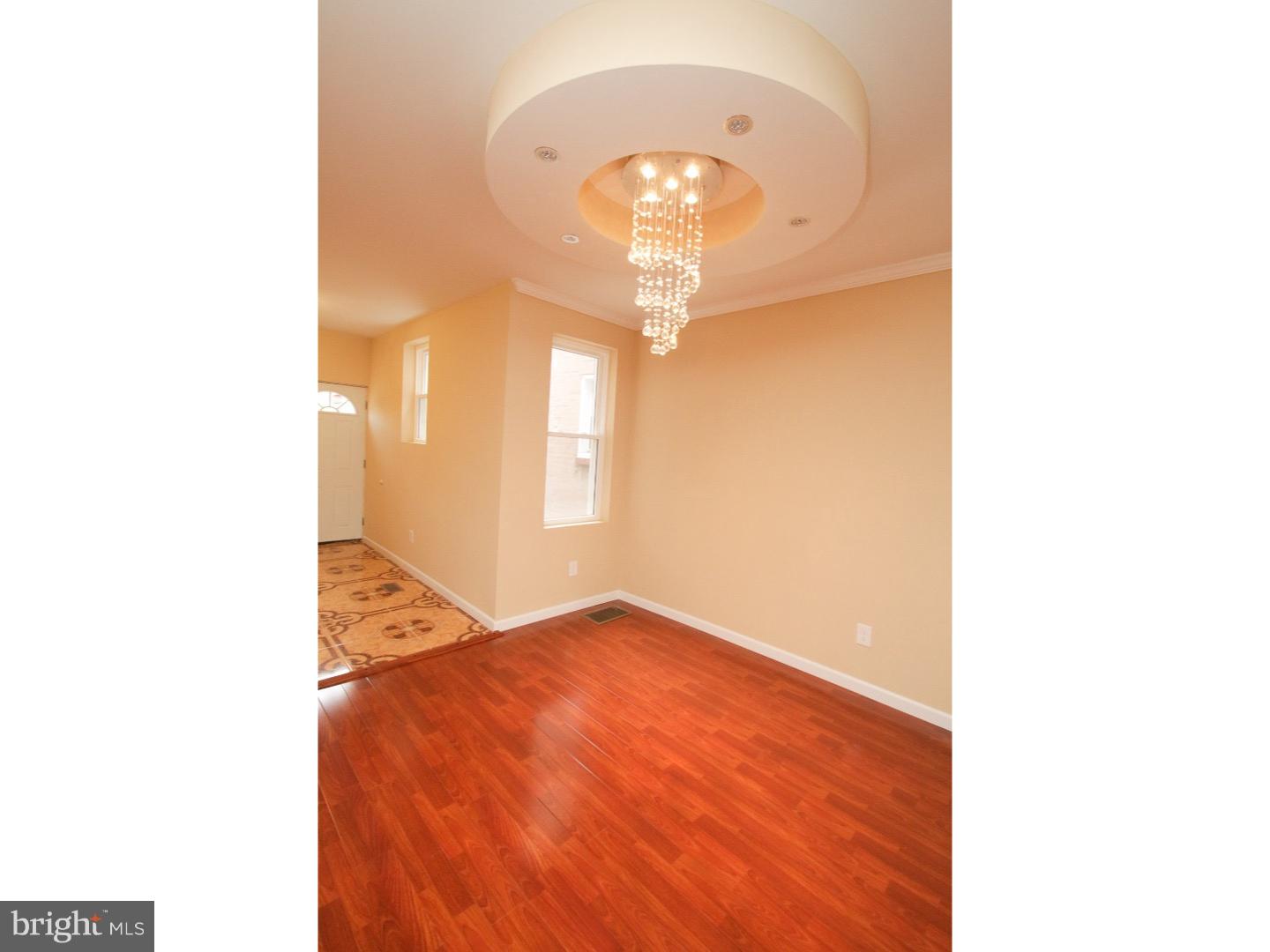 WOW! Look no further, good things come to those who wait! Unbelievable West Oak Lane Home Completely Knocked Out, ready for you to move into! Do you like elegance? Well this home is one of a kind and offers every extra a buyer can want. The entire home has new windows, a new roof w/ warranty, all new siding, updated electric & plumbing, and not to mention all new efficient Heating & AC Units! The 1st floor features a huge open layout with Brazilian Cherry floors, and a unique trey ceiling combo with recessed lighting & a Waterfall Chandelier! There is a brand new designer kitchen, which features GE appliances, Granite Counters, S/S Appliances & breakfast area! The first floor also includes a tiled powder room & a deck off the rear perfect for entertaining! The upstairs features 3 huge bed rooms, and a state of the art spa bath with a Corner Jacuzzi. Other key features include a completely tiled powder room and a full finished walk-out basement for your convenience. This home truly has it ALL and is a MUST SEE!