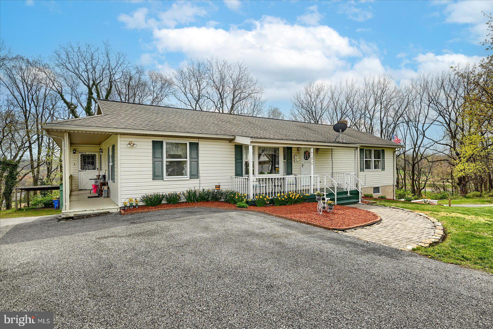 Welcome to this charming rancher nestled on 1.17 acres in Spring Grove Schools. This beautifully updated property offers a perfect blend of comfort and functionality, featuring 3 spacious bedrooms and 2 full bathrooms in the main home.   New flooring, fresh paint, and tastefully updated bathrooms that add a modern touch.
The heart of the home offers an open and inviting layout, ideal for everyday living and entertaining. Step outside to enjoy the expansive deck and large yard space, perfect for gardening, outdoor activities, or simply relaxing in your own private retreat.
In addition, this property boasts an attached in-law quarters with a separate entrance, offering 2 additional bedrooms, 1 full bath, and a convenient kitchenette — perfect for extended family or guests.
Completing this fantastic package is the new minisplit system throughout and a spacious 3-car garage, providing ample storage and workspace. This is a rare find — move-in ready, versatile, and situated on a generous lot with room to make it your own.