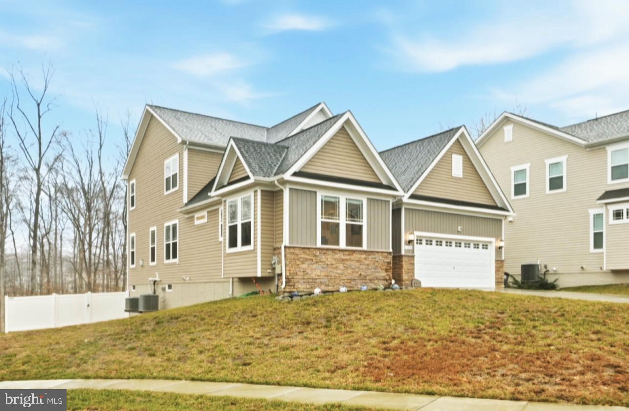 THIS IS IT — BACK ON THE MARKET!

Why wait 8-12 months for new construction when you can get like new and move in NOW!

This home features high-end upgrades and custom finishes that would cost extra with a builder.

Looking for PRIVACY, well this 
Home is located on a QUIET cul-de-sac. This rare gem is located on a PREMIUM LOT. Which means it’s the only home in the neighborhood that has an EXTENDED driveway that supports multiple parking, up to 7 parking spots.

Nestled in the sought after Highlands community, 11101 Applecross Court is a stunning multigenerational home that delivers the look and feel of new construction with premium enhancements already complete. Built in 2023, this expansive residence offers 5 bedrooms, 4.5 baths, and exceptional flexibility designed for modern living.

From the moment you arrive, the stone-front façade, custom stone walkway, and fully finished 3 car garage set this home apart. The garage is painted, trimmed, and includes a Tesla EV charger—a rare upgrade not typically included in new builds.

Inside, the main level features a gourmet kitchen with stainless steel appliances, double ovens, and an extended island perfect for gatherings. The open family room is anchored by a cozy gas fireplace, creating a warm and inviting atmosphere.

A true highlight is the Next Gen suite, complete with its own private entrance, kitchen, family room, washer/dryer, and full bath—ideal for in laws, extended family, guests, or rental versatility. An interior door allows for privacy or seamless connection to the main home.

Upstairs, you’ll find three spacious bedrooms, two full baths, and an oversized laundry room. The primary suite offers a tray ceiling and abundant natural light, creating a peaceful retreat.

The fully finished lower level adds even more flexibility with an additional bedroom and full bath—perfect for guests, recreation, or a home office. Outdoors, enjoy a fully fenced backyard, an expansive deck with access from both the main level and walk out basement, and an in ground trampoline the sellers are leaving for the next owner.

Best of all, this home offers exceptional value compared to nearby new construction. Buyers avoid rising builder premiums, lot fees, and the long list of “optional” upgrades that quickly add tens of thousands to the final price. Another major cost advantage: unlike many builders who require buyers to pay 100% of recordation and transfer taxes, this resale allows buyers to avoid those additional out of pocket expenses—saving thousands at closing. Here, the premium features—EV charger, finished 3 car garage, extended deck, fencing, upgraded stonework, and fully completed Next Gen suite—are already included with no additional cost. What would take a builder 10–12 months and significantly higher out of pocket expenses is available now and fully finished.

This beautifully appointed home is less than 3 years old and truly MOVE IN READY!

Your new home is waiting for you!

Don’t HESITATE AND SCHEDULE A SHOWING TODAY.