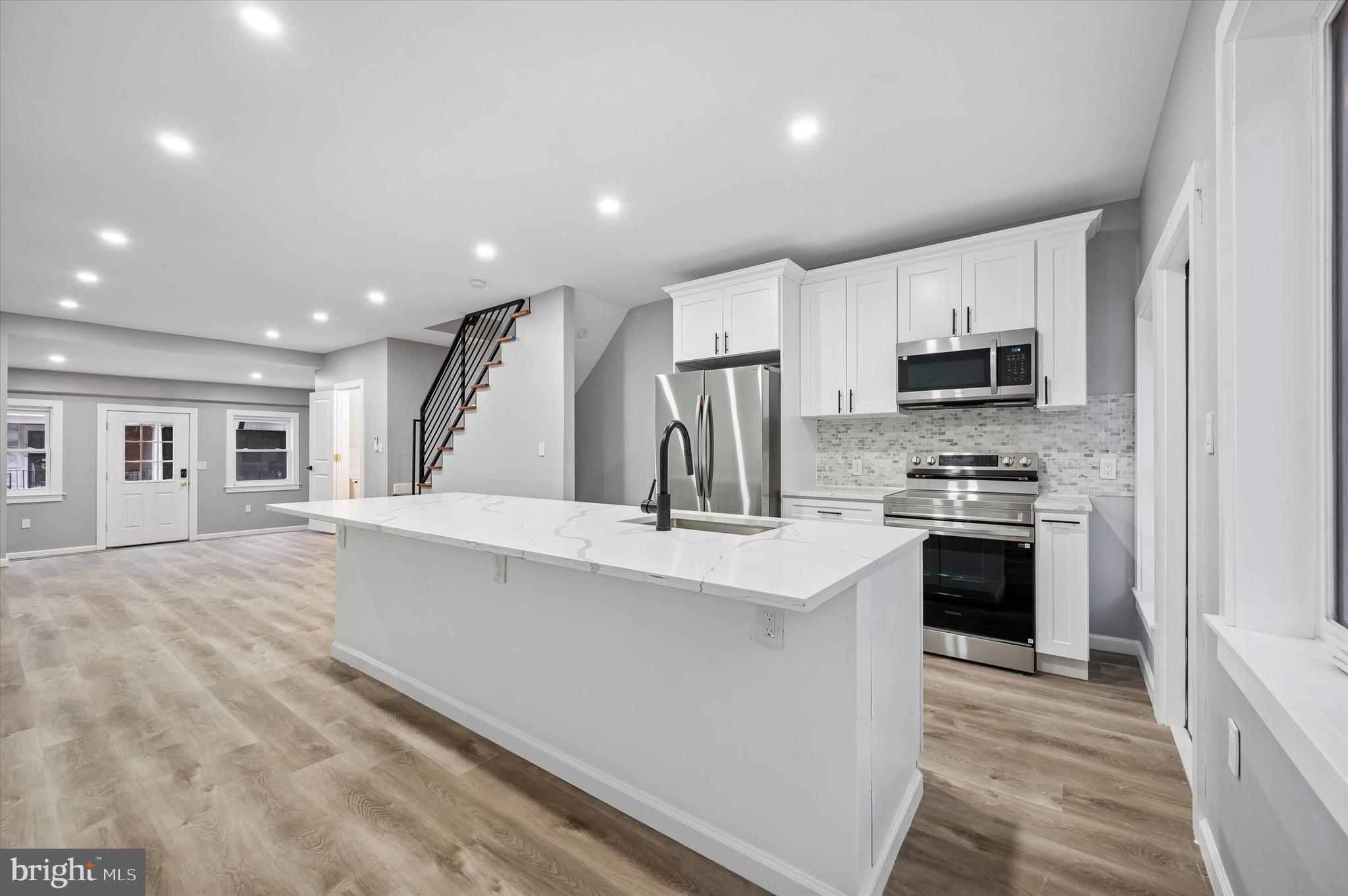 Welcome to 547 S Yewdall Street — a fully renovated, move-in ready home offering 1,515 square feet of well-designed living space. This 3-bedroom, 1.5-bath property features an open-concept main level with hardwood flooring, sleek iron railings, and a spacious kitchen anchored by an oversized island. A convenient first-floor powder room and direct access to a private rear outdoor area make the layout both functional and ideal for everyday living.

Upstairs, you’ll find three comfortable bedrooms and a modern full bathroom, easily accommodating a variety of living needs including guest space or a home office setup. The fully finished basement adds valuable additional living space—perfect for a media room, gym, or secondary lounge—and includes rear access to the outdoor area, a rare and practical feature.

A turnkey opportunity at an accessible price point—547 S Yewdall is ready for its next owner. Schedule your showing today.