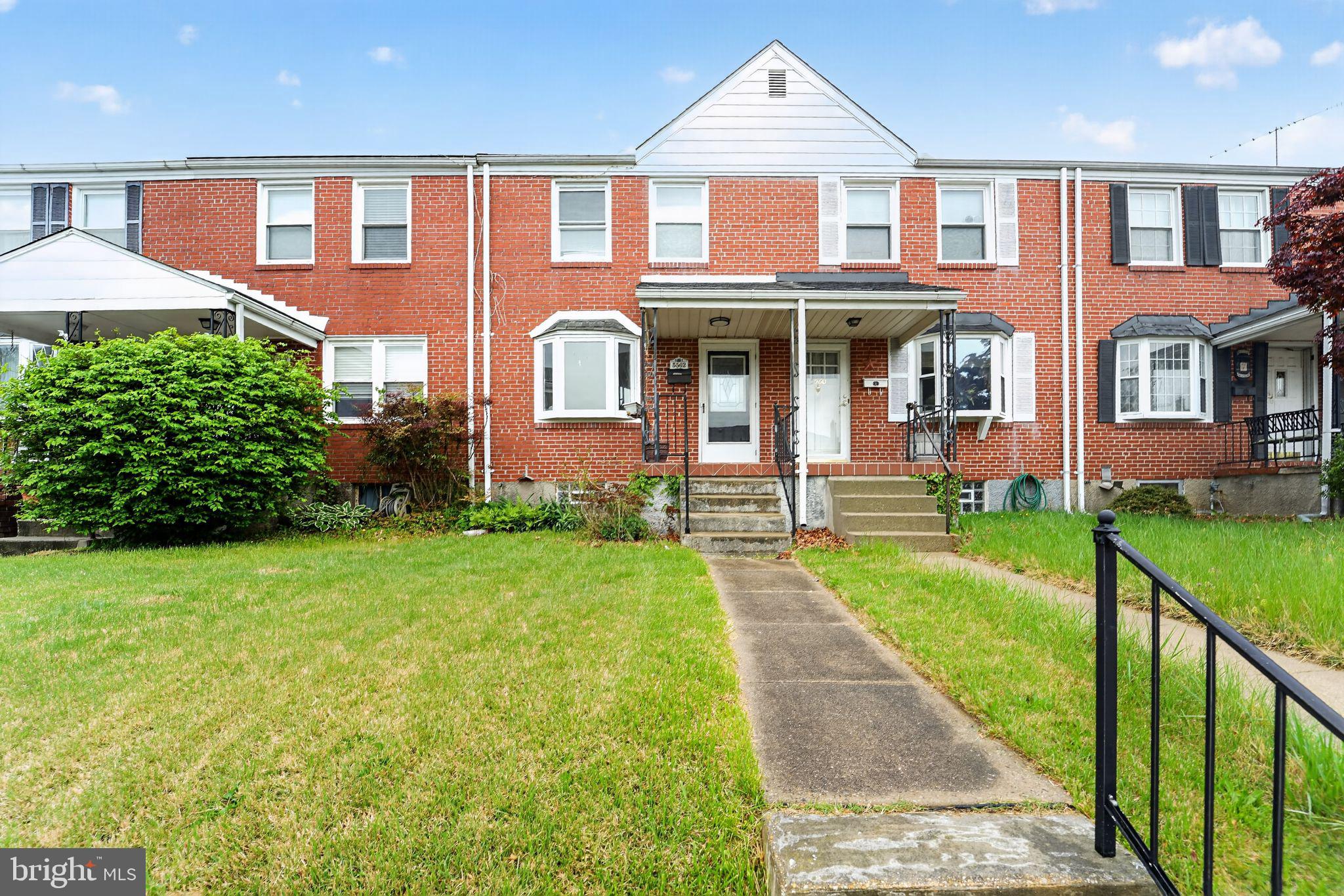 This beautifully updated 3-level brick townhome in Gaylord Manor offers the perfect blend of classic charm and modern convenience. The main level welcomes you with stylish luxury vinyl plank flooring, a fresh neutral palette, and an open-concept living and dining area. The kitchen is a standout, featuring newer cabinetry, sleek quartz countertops, and a full suite of stainless steel appliances. The upper level boasts three spacious bedrooms and one bathroom showcasing porcelain tile, a  vanity, and modern fixtures. The fully finished walk-out basement adds incredible value, providing a versatile recreation room and plenty of storage. Step outside to your large fenced backyard, an ideal space for summer BBQs and outdoor activities.