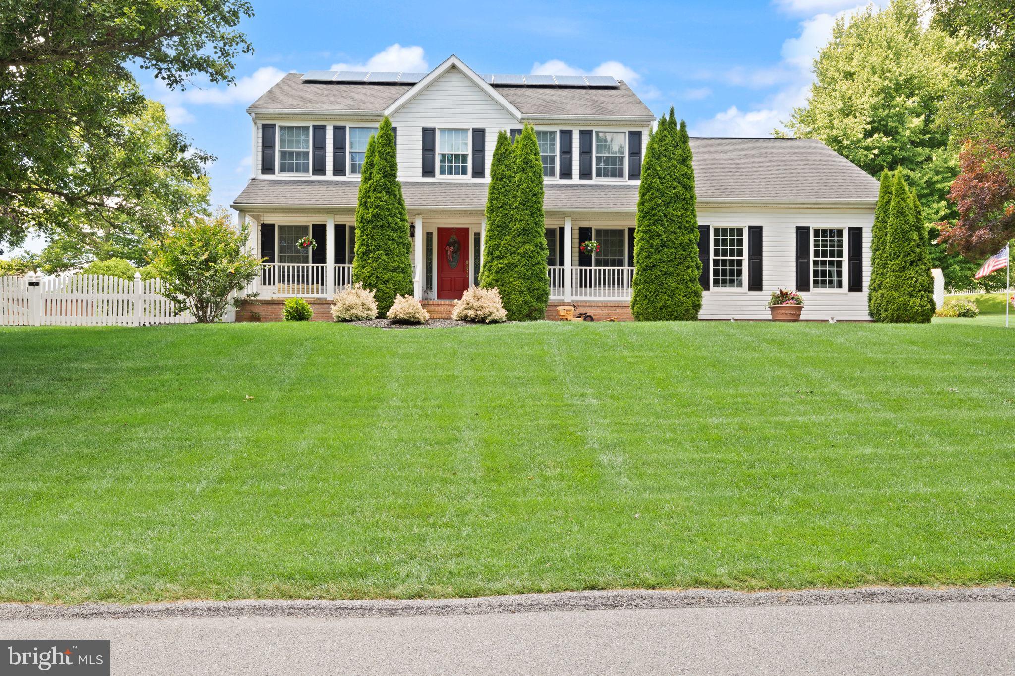 Welcome home to this pristine, energy-efficient Colonial that effortlessly blends modern luxury with incredible cost-saving sustainability. If you are looking for a home that checks every single box on your wish list, this 4 to 5 bedroom, 2.5 bath masterpiece is the one you’ve been waiting for!
From the moment you step inside, gleaming hardwood floors guide you through a bright, thoughtful layout. The sun-drenched front office is perfect for remote work, while the formal living and dining rooms feature elegant crown molding made for hosting. Nearby, the upgraded gourmet kitchen steals the show with gorgeous quartz countertops, a gas stove, stainless steel appliances and a cozy breakfast view into the family room, where a warm gas fireplace awaits. You’ll also love the main-floor laundry room, tucked behind a trendy barn door right off the spacious 2-car garage.
Upstairs, the luxury continues with beautiful hardwoods throughout all the bedrooms. The primary suite is a true private retreat, boasting two closets and an upgraded ensuite bath featuring double vanities and an extra-large, custom walk-in tiled shower. Three more generously sized bedrooms offer plenty of space, including a massive bonus room that easily serves as a fifth bedroom or second office. There is even a huge walk-in closet that can easily be converted back into a second-floor laundry room if you prefer!
Your summers just got a major upgrade with a backyard built for staycations. Unwind on the massive 20x20 screened porch, or cool off in the crystal-clear, custom concrete inground pool, complete with a soothing waterfall feature, a high-efficiency heater, and a self-cleaning system. After a long day, soak in your private hot tub or tend to the raised garden bed. The beautifully fenced yard also features a custom, professionally leveled Amish-built Penn Dutch shed for all your storage needs. 
The best part? You can say goodbye to high utility bills. This home is engineered for maximum savings with a massive 9 kW solar panel system, energy-efficient 2x6 walls with R19 insulation, a high-efficiency heat pump, and a natural gas heating system.
With an unfinished basement ready for your personal touch, a freshly sealed driveway, and professional lawn treatments already paid for through the rest of 2026, this home is entirely turn-key and ready for its next chapter.