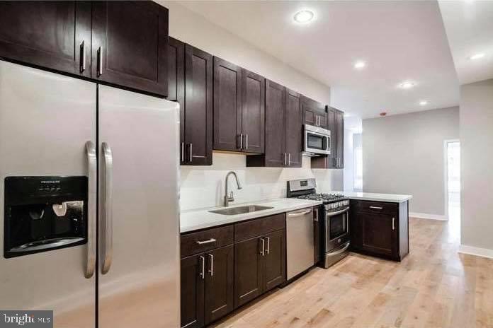 Welcome to this spacious and modern 2-bedroom, 2-bath flat featuring a private balcony and the benefit of a remaining tax abatement. The open-concept layout includes a luxury kitchen with island seating, upgraded stainless steel appliances, quartz countertops, and a subway tile backsplash. The adjoining dining and living areas offer wide-plank hardwood flooring and oversized windows that fill the space with natural light.
A full-sized washer and dryer provide added convenience. Both bedrooms are generously sized with excellent closet space. The bathrooms showcase sleek, contemporary design with Porcelanosa tile and fixtures. The primary suite offers a stunning private bath with an oversized walk-in shower, natural stone accents, and double vanities.
Located just two blocks from Fairmount Avenue and Broad Street, where you’ll enjoy an ever-growing selection of restaurants and cafés. Walk to City Hall, the Comcast Center, and numerous neighborhood amenities. Currently leased month-to-month, this income-producing property is an exceptional opportunity. Tenants current monthly rent is $2,025. Schedule your showing today.