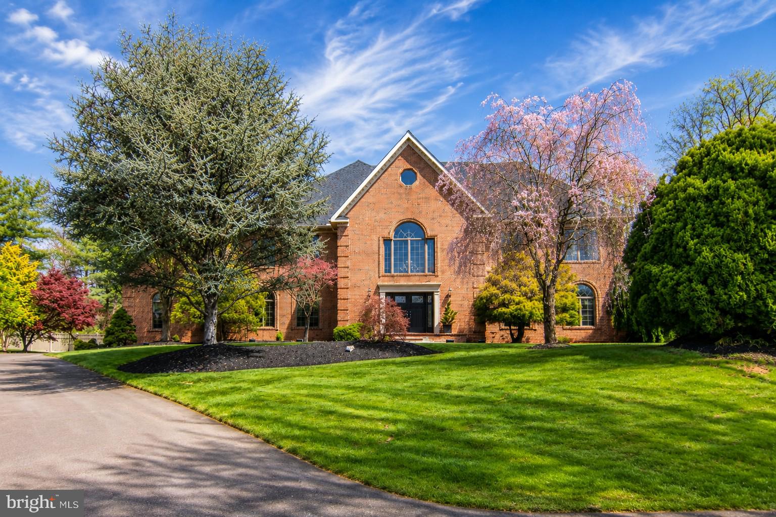 Welcome to this magnificent home in the prestigious Brightwood Acres East, set on a large, private lot consisting of 1.20 acres and offering over 12,000 finished square feet across four levels. This luxurious residence has been fully renovated with no detail overlooked, ensuring top-of-the-line appointments and fixtures throughout.

The heart of the home is the expansive kitchen, featuring a Sub Zero refrigerator and ice maker, Wolf range, and Cove dishwasher. Enjoy meals in the eat-in area or host elegant dinners in the separate dining room. The family room boasts a striking floor-to-ceiling custom fireplace, perfect for cozy gatherings. The impressive foyer, with its double circular staircases, sets the tone for this grand home.

The home’s interior is adorned with new hardwood and travertine flooring throughout the first and second floors, while the basement features new travertine flooring and the third floor is comfortably carpeted. The electrical system has been upgraded, and the new HVAC systems, all under five years old, provide reliable comfort. The newly paved driveway and new front door add to the home’s curb appeal.

Step outside to a private backyard oasis with a heated in-ground pool and a renovated deck. The mature landscaping offers a serene and private setting for outdoor enjoyment.

Indoors, the luxury continues with new granite countertops and sinks, solid hardware, and new recessed lighting throughout. The master bathroom features a large soaking tub with heated air jets, new custom showers with shower glass, and updated walk-in closet shelving in both master closets. Every bathroom in the home has been renovated with high-end fixtures, ensuring a spa-like experience.

The fully finished third floor and basement offer additional living space, including a custom wine cellar, new acoustical tile ceiling in the basement, and new laundry room appliances. The office/library is enriched with built-in bookshelves, and new Restoration Hardware chandeliers add elegance throughout the home.

This exceptional property is equipped with two new 85-gallon Marathon water heaters with a lifetime warranty, ensuring ample hot water supply. The open floor plan, high ceilings, and luxurious finishes make this home a rare find.

Qualified buyers only, please. This exquisite home is ready to welcome its new owners to a life of luxury and comfort.