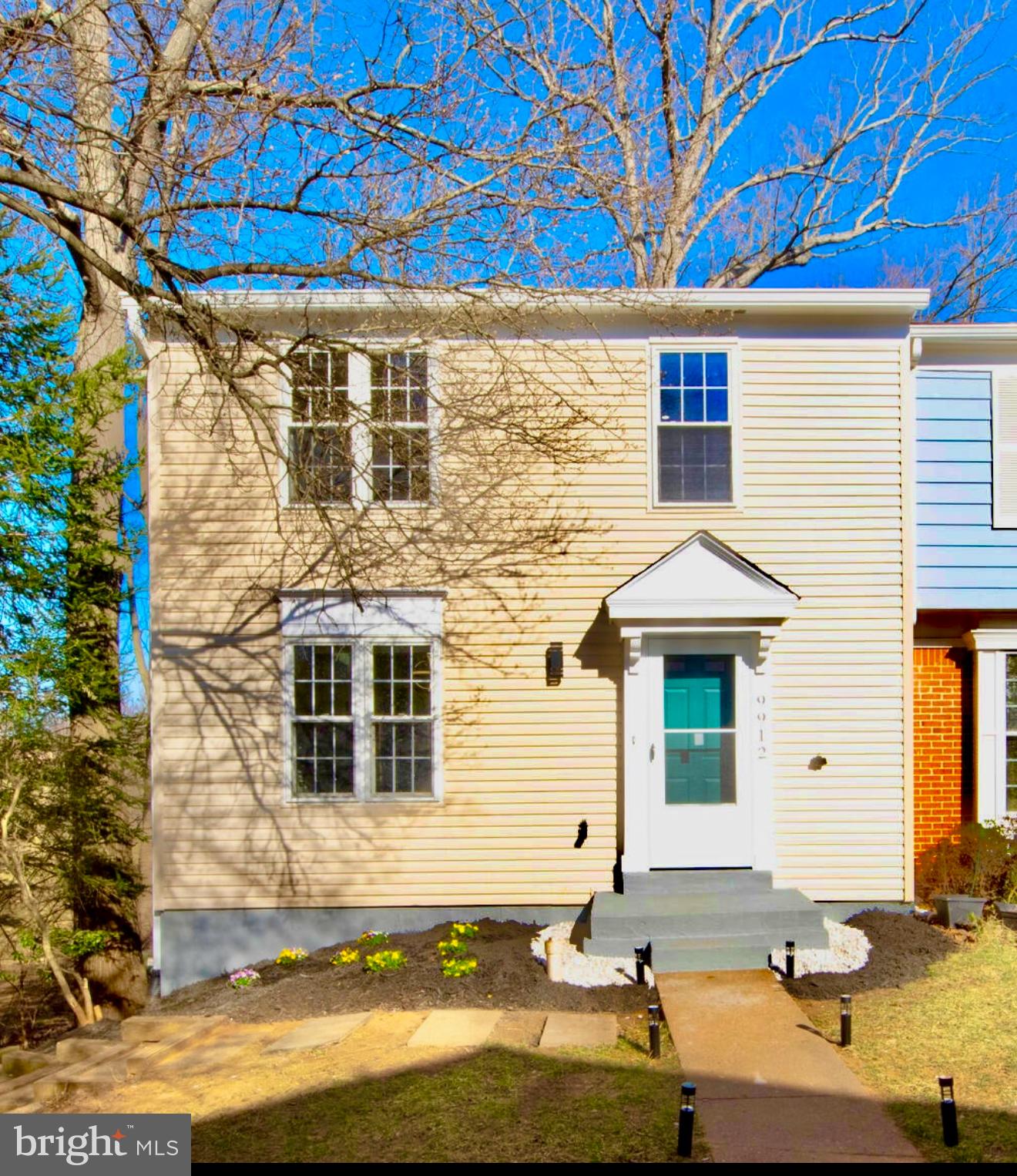 Nestled in the heart of Burke Centre, this fully renovated end-unit townhome offers an exceptional blend of modern upgrades and serene living. Completely transformed from top to bottom, the home features a brand-new HVAC system, roof, siding, water heater, wood floors, bathrooms, kitchen, and storm door, ensuring a move-in-ready experience.

 The main level boasts an open and inviting layout, with a beautifully updated kitchen that includes a breakfast nook and a separate dining area that opens to a spacious deck overlooking a stunning wooded view. Upstairs, 3  generously sized bedrooms are complemented by 2  fully renovated bathrooms, while a half bath on the main level adds convenience. 
The fully finished walkout lower level functions as a separate suite with its own entrance, a full bath, and a closet, making it ideal for guests, an in-law suite, a home office, or additional living space. The private patio offers a peaceful retreat and includes a hot tub, which is being sold as-is. 

As one of the largest townhomes in the neighborhood, this home provides both space and comfort, along with two assigned parking spaces. Situated within moments of Royal Lake Park, residents will enjoy easy access to scenic trails and outdoor amenities, while nearby shopping, dining, and major commuter routes make daily life effortless. This is a rare opportunity to own a meticulously upgraded home in a prime location. Agent is related to the owner.