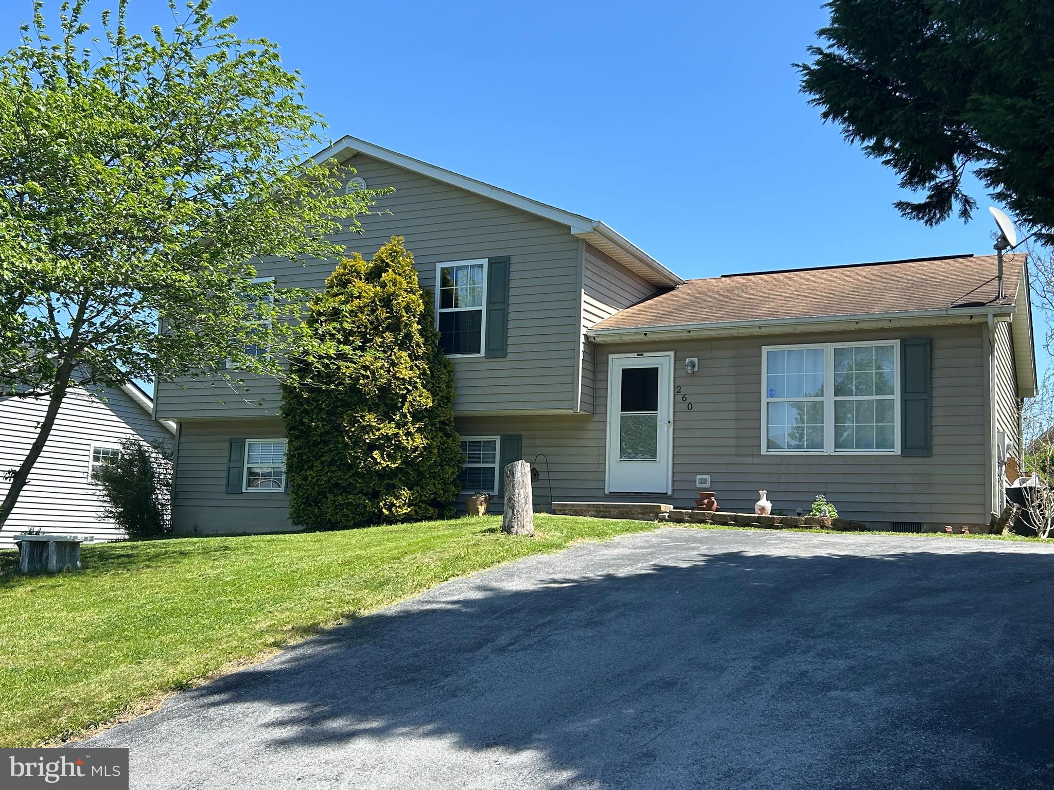 Come see this SPACIOUS 1700+ square foot home with 3 sizable bedrooms and 3 full bathrooms! The tri-level/split architecture provides privacy on each level, with a kitchen and living room on the main level, 3 bedrooms and 2 bathrooms upstairs, and a walk-out great room, full bath, and laundry on the lower level. The floor plan is very functional and allows flexibility; the lower level is currently used as a private suite, and one of the upstairs bedrooms is used as an office. Perfect for multiple generations living under one roof! Advantages include quality vinyl floors, lots of closets, public water and sewer, the quiet cul-de-sac location, and a flat, grassy backyard that is ideal for a garden, play space, or pets. The property needs TLC yet has untapped potential for someone who wants to make their own design choices and likes projects. Wildflower Creek Estates is an established neighborhood with a picturesque pond for fishing and nature watching. The location is convenient to shopping, schools, and Interstate 81.