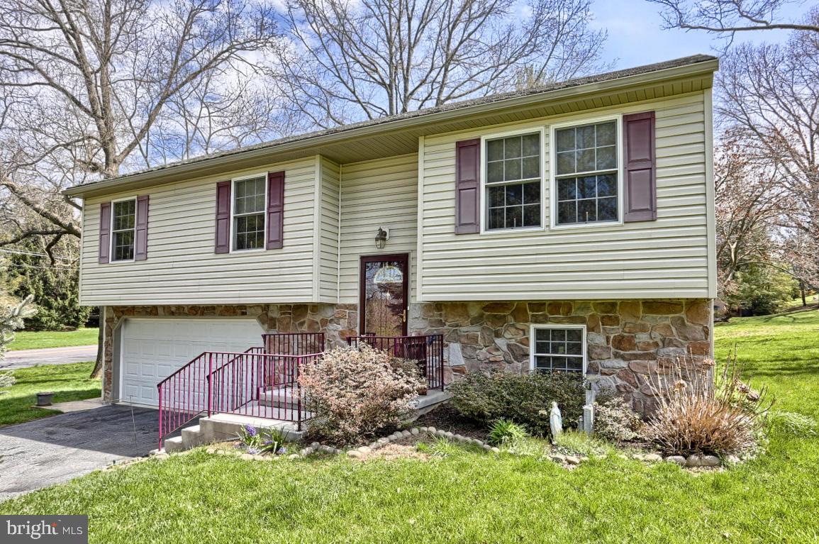3 bedroom bi level home in Penn Manor schools. Eat in kitchen with dining area and breakfast bar, finished lower level with wet bar, laundry room and half bath. Rear deck leads to spacious backyard with beautiful magnolia tree and shed.  Climate controlled garage and upgraded lighting.