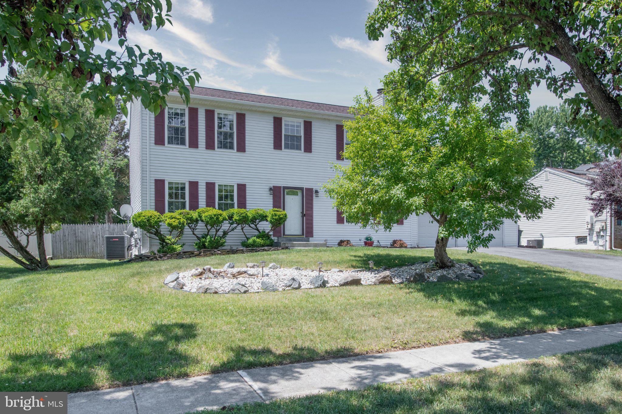 This charming Colonial home in Piscataway Estates offers a perfect blend of comfort and functionality. With 4 spacious bedrooms and 3.5 bathrooms, there's ample room for relaxation and privacy. The heart of the home features a cozy fireplace, ideal for creating warm memories during chilly evenings. The fully finished basement provides additional living space, perfect for a playroom, home office, or entertainment area. The kitchen is equipped with modern appliances, including a built-in microwave, dishwasher, and stove, making meal prep a breeze. Step outside to a well-maintained .24 acre lot, offering plenty of space for outdoor activities. The attached garage and ample driveway parking ensure that you and your guests will always have a place to park. This home is ready to welcome you with open arms! Experience the warmth and charm that makes this property a true haven.