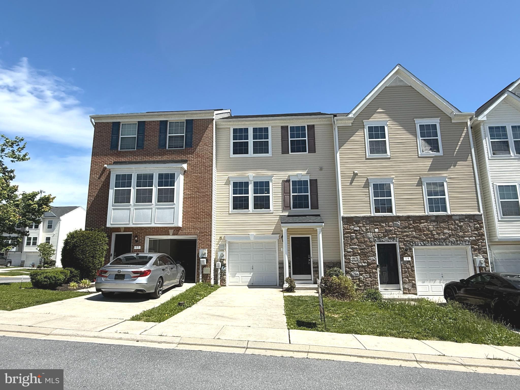 This beautiful 3 story townhouse has 4bedrooms,2 & 2 1/2 bathrooms, 1 car garage and a back deck. Open-floored with upgraded cabinetry, kitchen island, and black appliances. Beautiful fresh new paint and new hard surfaced flooring and a lot more. This home is located in Riverside Villages subdivision of Berkeley County,1 min to I-81, 5 mins to Martinsburg,15 minutes from Hagerstown, and 15 minutes to MARC Train for easy transportation.