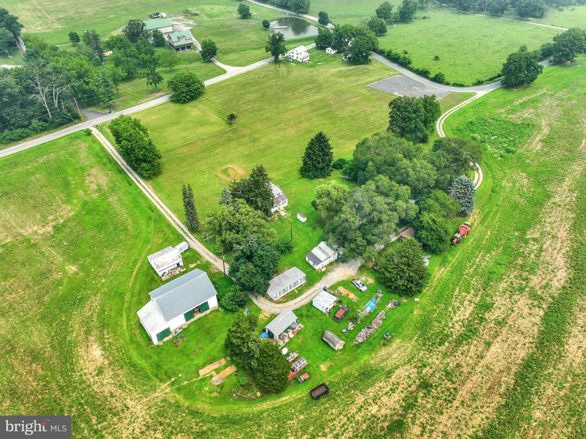 Photos coming soon....This exceptional farm property offers the perfect blend of history, functionality, and potential on approximately 35 picturesque acres. Featuring two homes, and a guest house, a traditional  barn, and multiple outbuildings, this one of a kind property is ideal for multi-generational living, farming,  or creating your own private country estate. The expansive acreage provides open fields, scenic views, and endless possibilities for livestock, recreation, or future vision. Whether you're looking to continue its farming legacy, establish a homestead, or invest in a truly unique property, this rare offering delivers the space and versatility you've been searching for. Conveniently located in desirable Hellam Township, you'll enjoy the tranquility of rural living while remaining just minutes from York, Wrightsville, Lancaster, and major commuter routes.