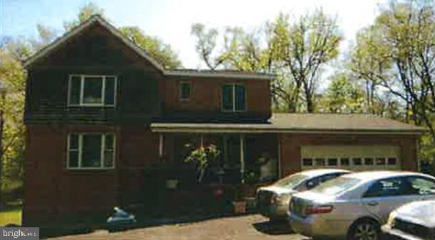 Property being sold strictly as-is. Home sits back from Livingston Road down a long driveway and is very private. Property features a 2-car garage, wood floors throughout the main level and 2nd level, a formal dining room, and a full unfinished basement with a partially finished full bathroom. Home is in need of updating/repair/renovation. The roof was replaced in 2025. Please contact listing agents for showing availability. DO NOT ENTER DRIVEWAY OR PROPERTY WITHOUT PRIOR AUTHORIZATION FROM LISTING AGENTS AND WITHOUT ADVANCE CONFIRMED APPOINTMENT. Adjacent 2.43 acre vacant wooded lot at 10404 Livingston Rd (MDPG2206082) is also available. Additional photos to be provided 6/8.