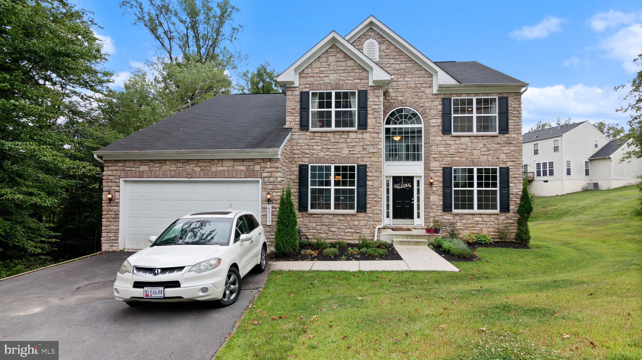 NEW PRICE! Incredible 2015 Built, Expanded K Hovnanian Alaska Model on an Ultra-Private, Premium 1/3+ Acre Lot, Backing to Trees, with Every Upgrade Imaginable. This home has 6 bedrooms, 4.5 baths, and boasts approximately 4300 finished SqFt, and is located in Sought After Hanover Manor Crossing.  Main Level features an Open Foyer Leading to the Leading to the Living Room and Dining Rooms. Gourmet Kitchen with Expanded Island, Wall Oven & Cooktop, 42" Raised Panel Espresso Maple Cabinetry, Granite, a Pantry, and opens to the Family Room and Morning Room/Sunroom. The Kitchen Opens to the Newly Built 25K Composite Deck with Vinyl Railings (Never Requires Maintenance), with a Gutter and Lighting System, Overlooking the Private Back Yard. The Expansive Family Room Opens to the Office which doubles as a Main Level Bedroom. Main Level is highlighted by 5-Inch Wide Plank Hardwood Floors throughout the Family Room, Kitchen, and Morning Room, Recessed Lights, and A Dual Staircase leading to the Upper Level.  The Upper Level features the Expansive Owner's Suite with a Luxurious Spa Bath including a Jetted Tub, Separate Shower, and Dual Vanity, as well as a Sitting Room, and a Large Walk in Closet with a Custom Closet System. 3 Additional Generously Sized Bedrooms are on the Upper Floor, with Walk in Closets and 2 Additional Baths.  The Finished Walkout Lower Level Features a Large Rec Room, a Bedroom, a Full Bath, Recessed Lights, Upgraded Carpet Throughout, and a Large Storage Area Additional Upgrades include a Whole-House Central Vac, Recessed Lights Throughout Every Level, Nest Thermostats and More. This house is Perfect for Guests & Entertaining with the Private Back Yard, Spacious Deck, and the Private Driveway for Plenty of Guest Parking.